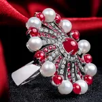 Pager to activate Infinia Pearl Cabochon Rubies Ring