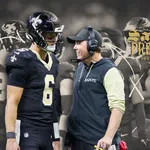 New Orleans Saints player and coach discussing during game with team preview text and strategy graphics overlay.