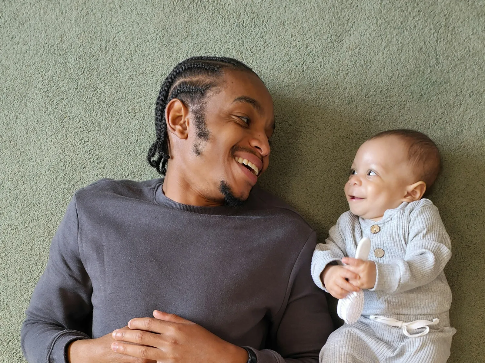 a person holding a baby