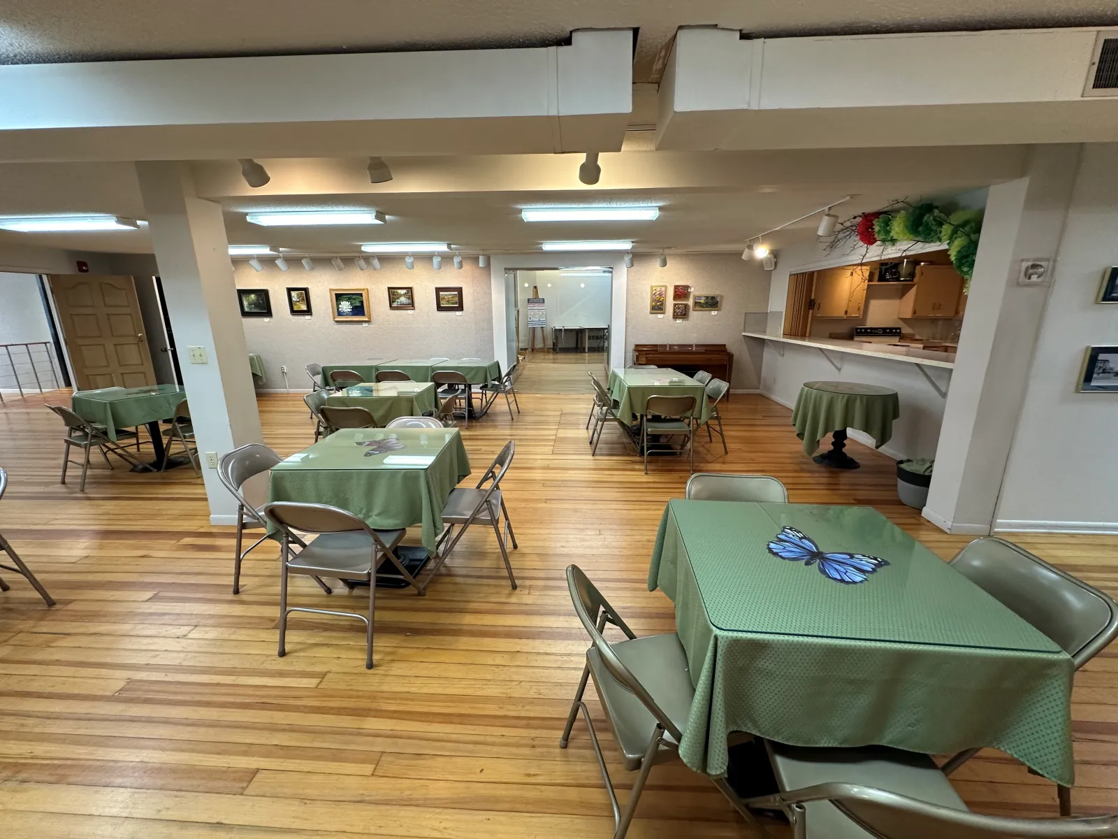 a room with tables and chairs