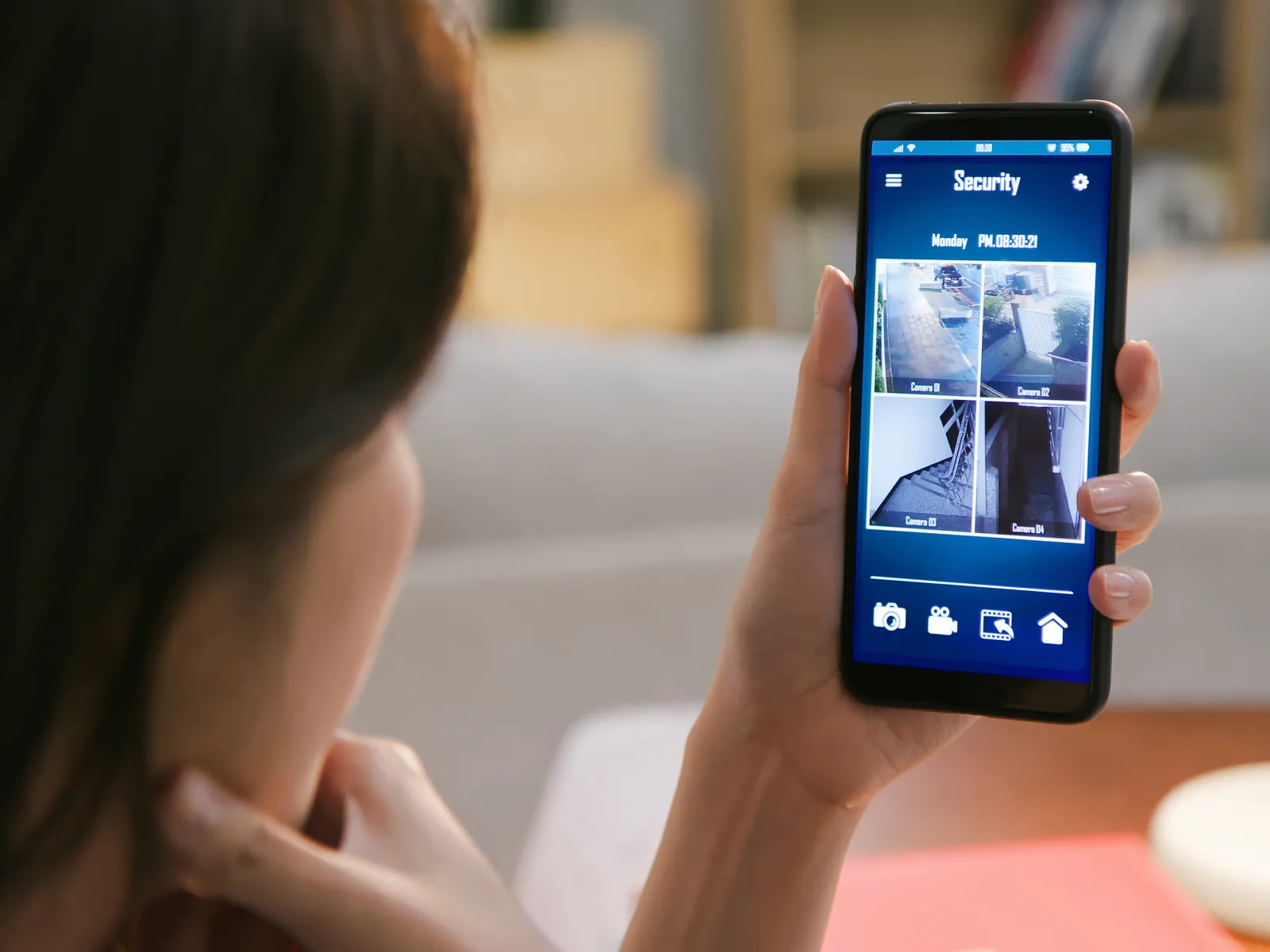 a woman holding a phone