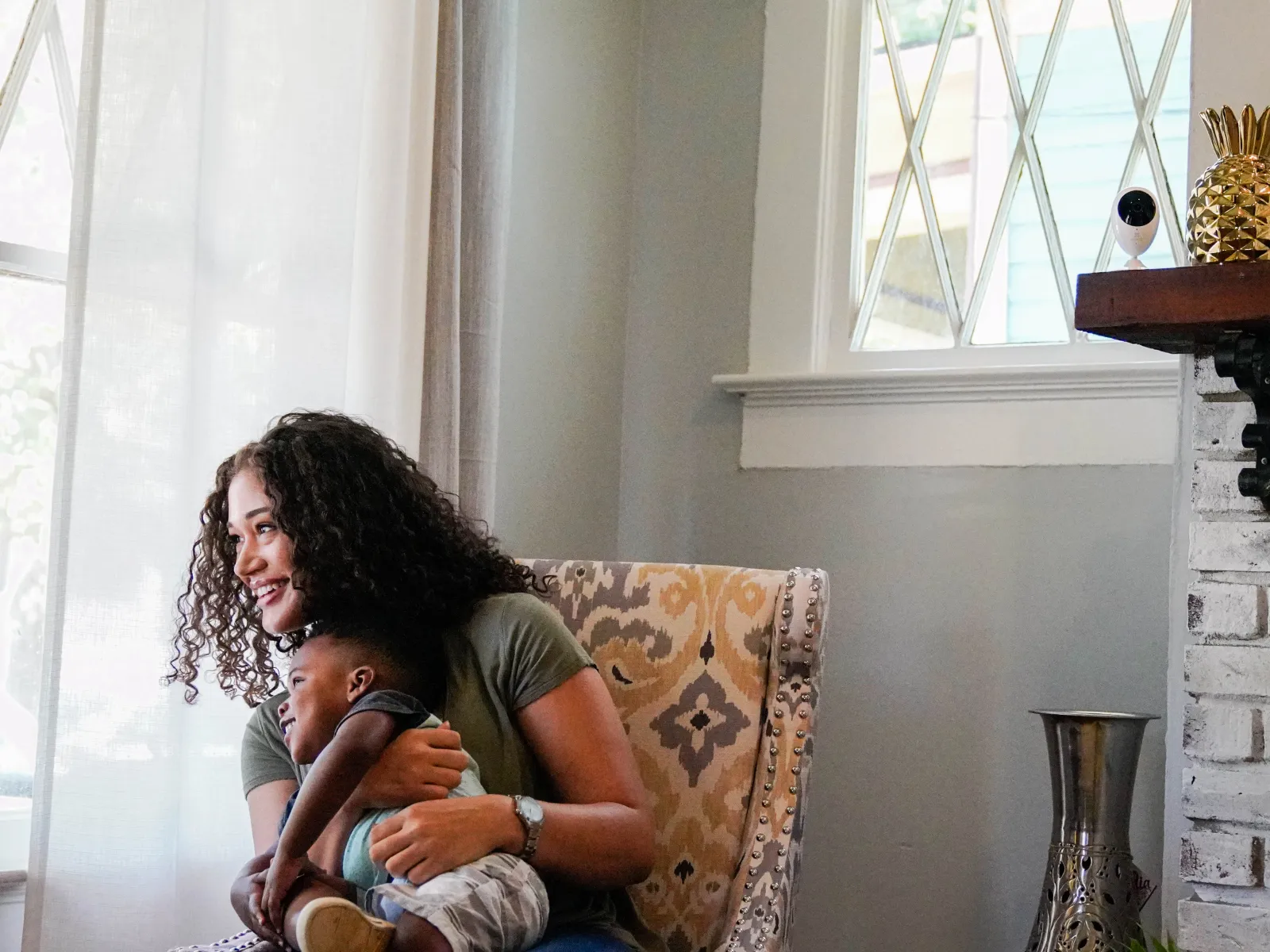 a woman holding a baby