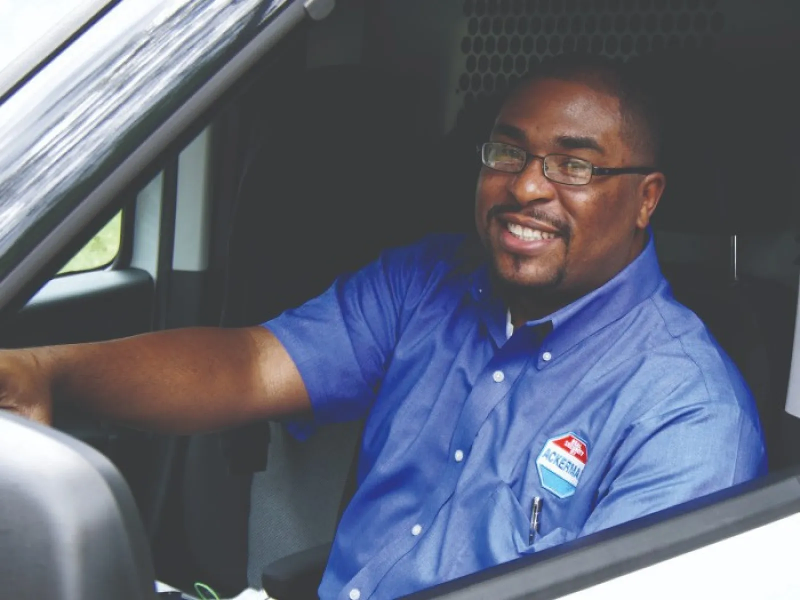 a man in a blue shirt