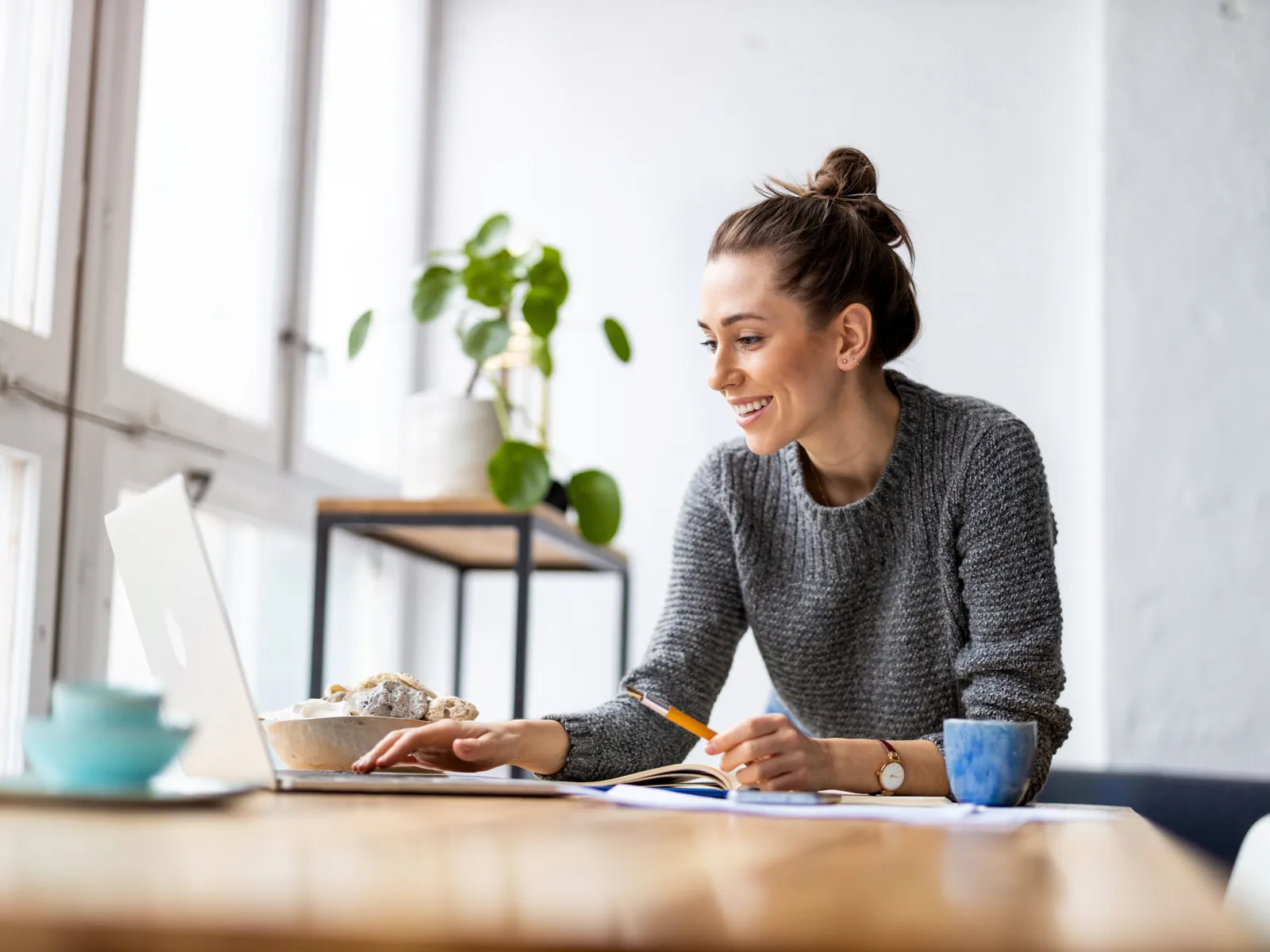 a woman working on her laptop