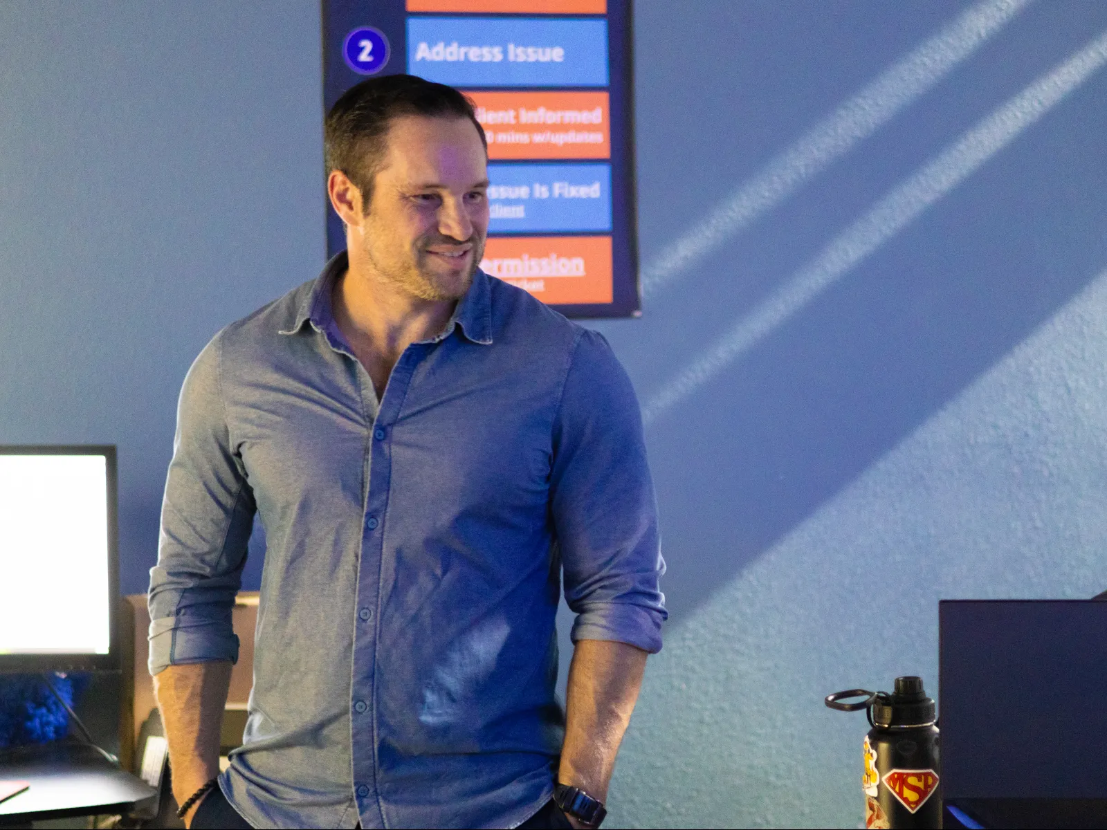 Chris Raab standing in front of a computer