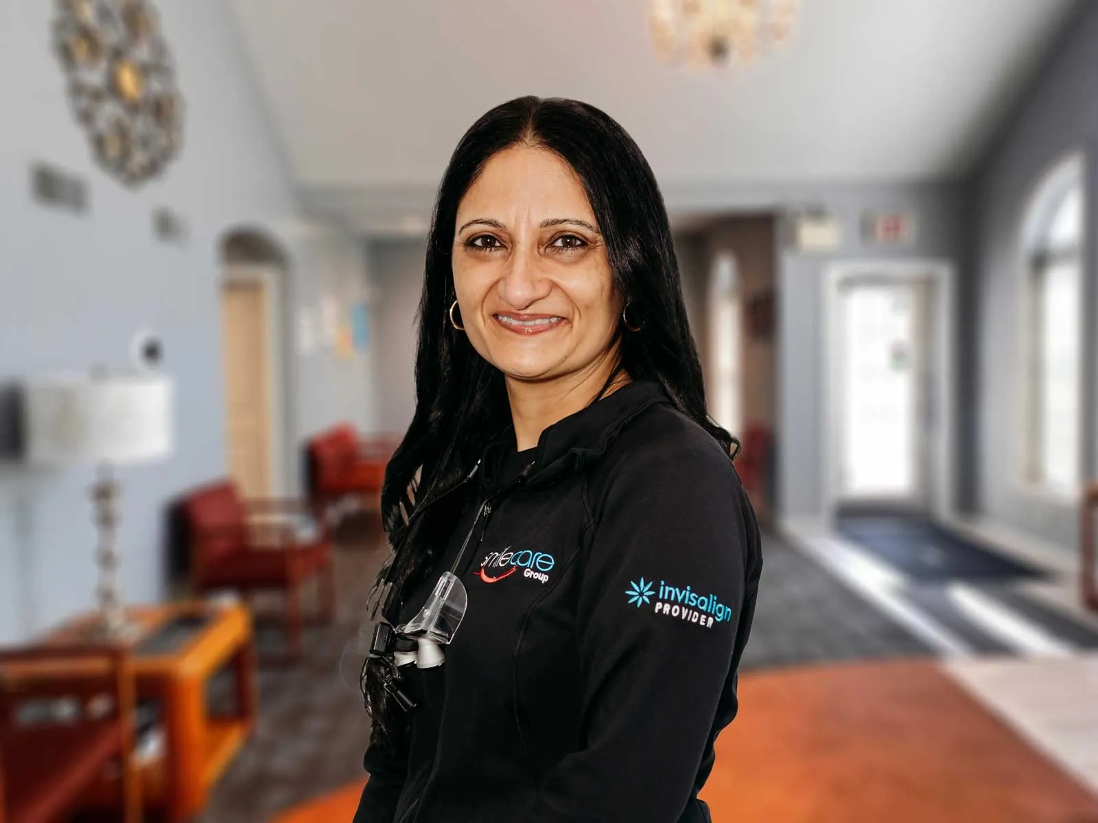 a woman smiling for the camera