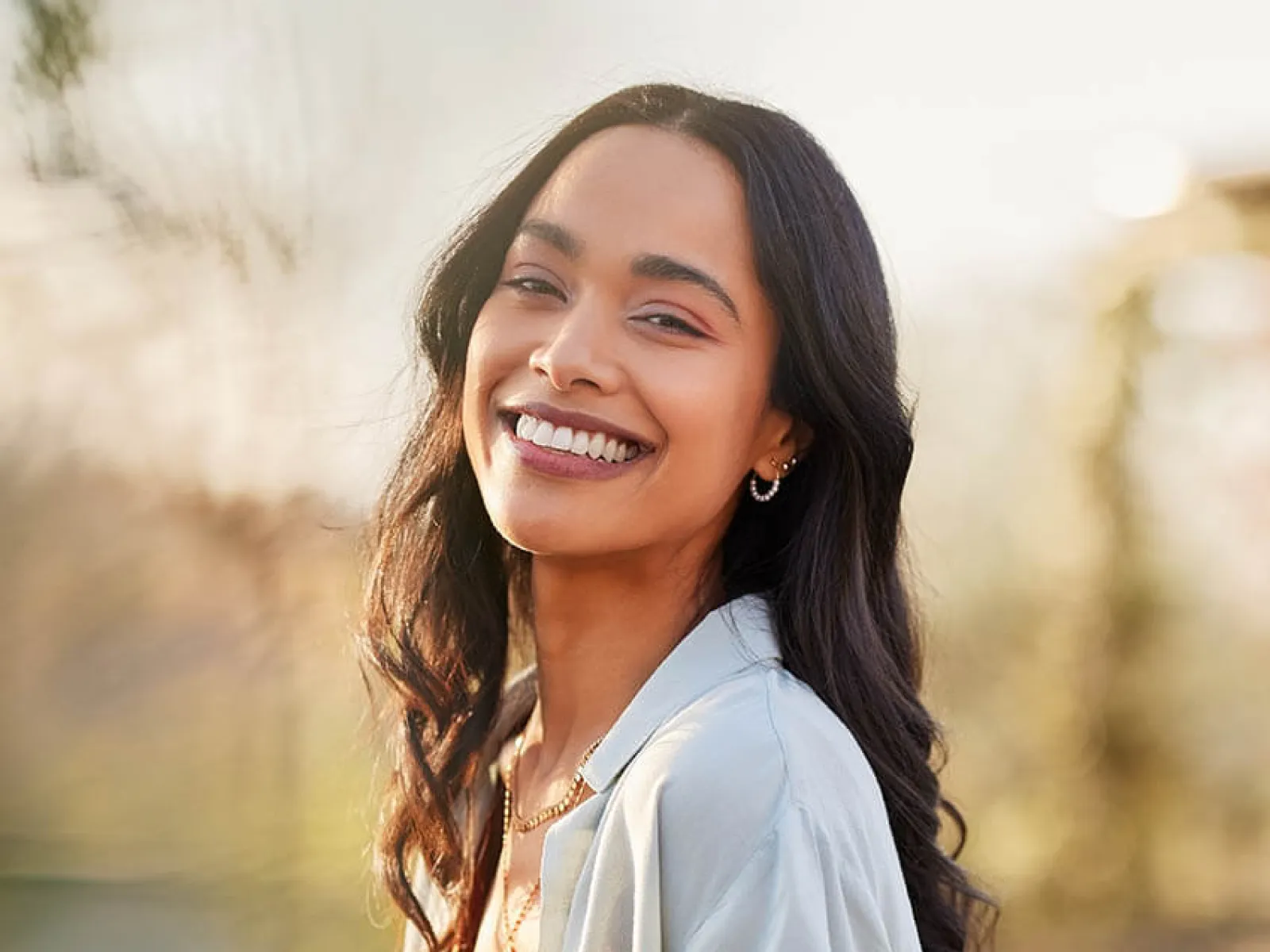 a woman smiling at the camera