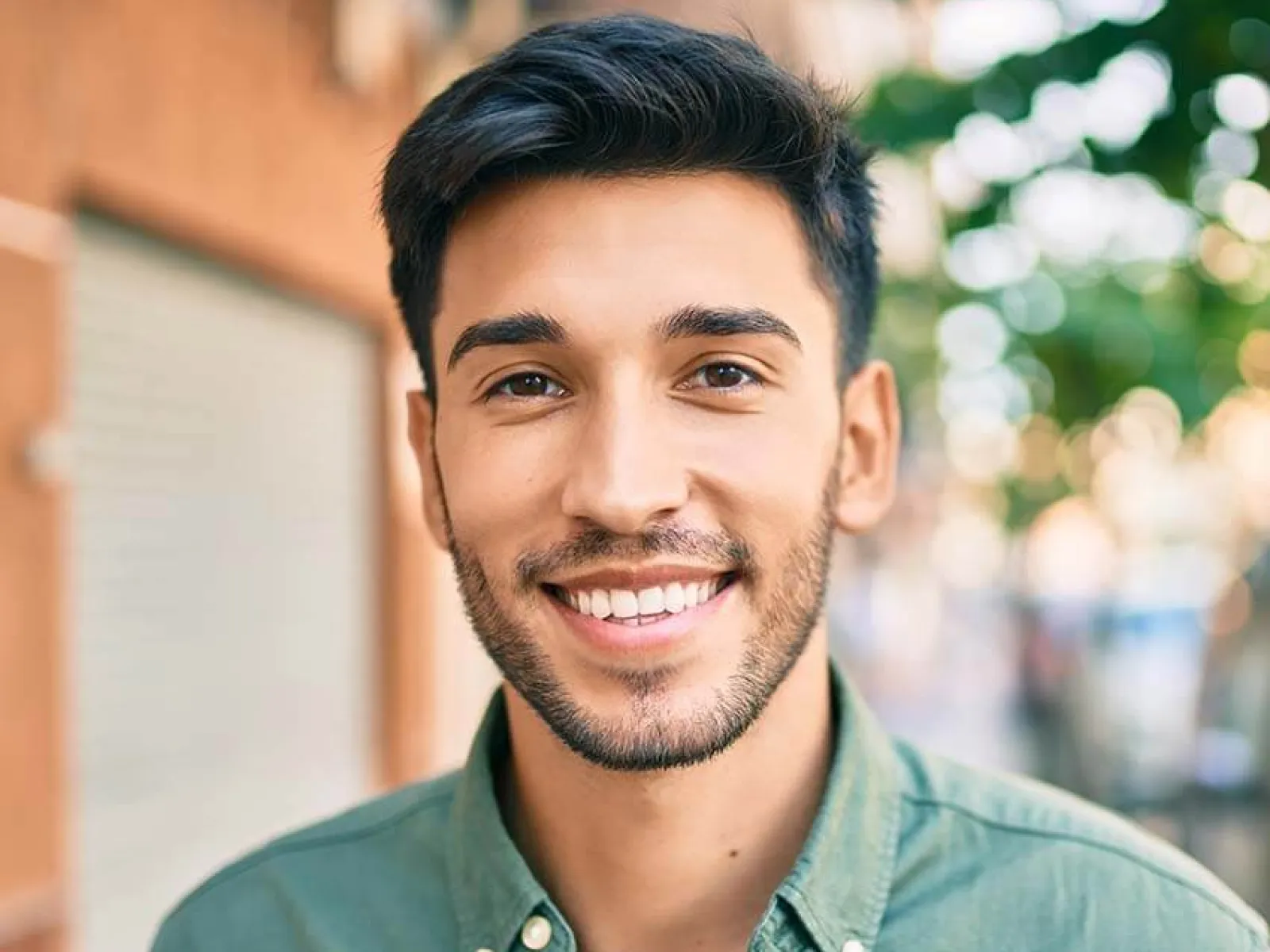 a man smiling for the camera