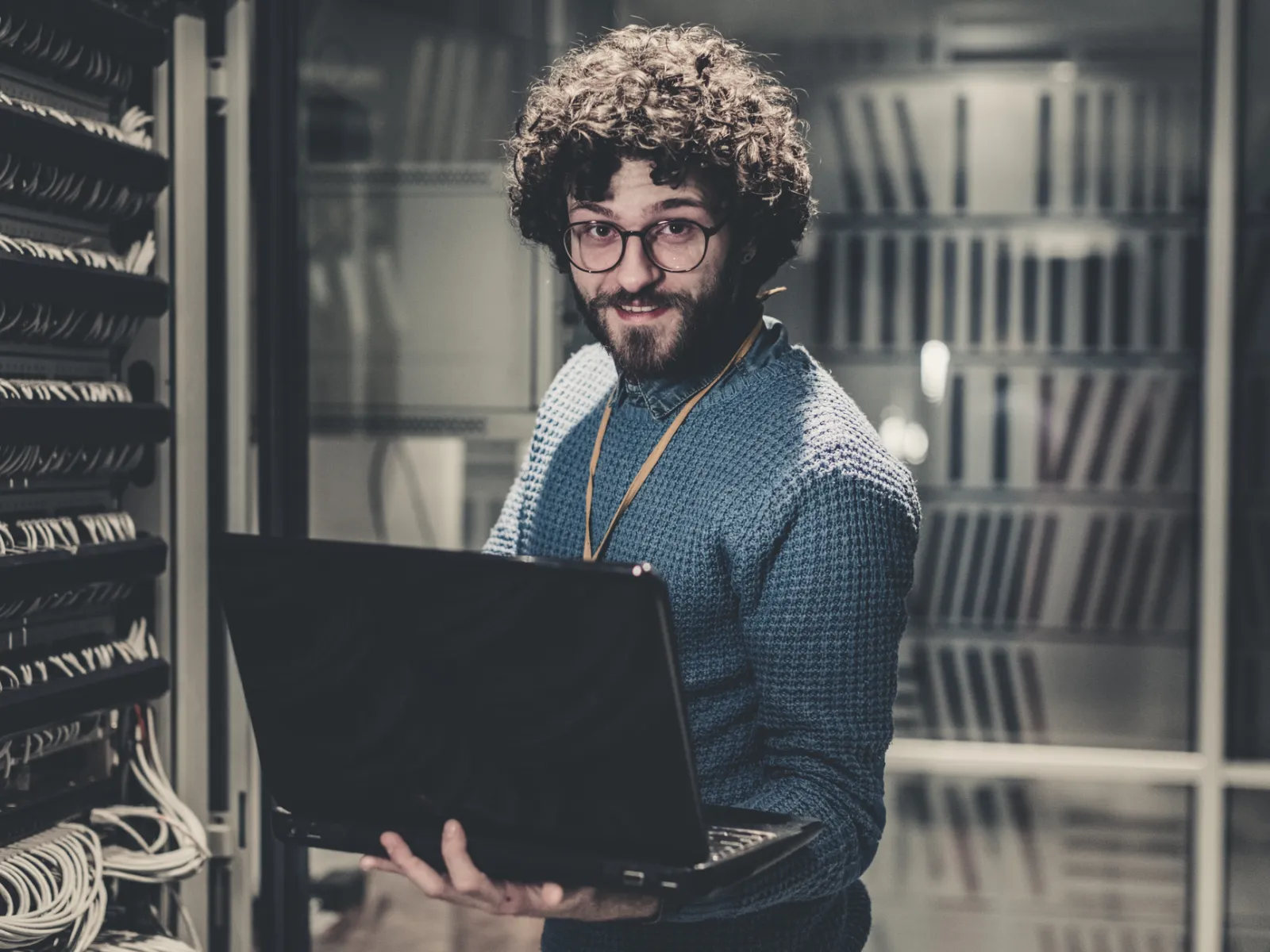 a person holding a laptop
