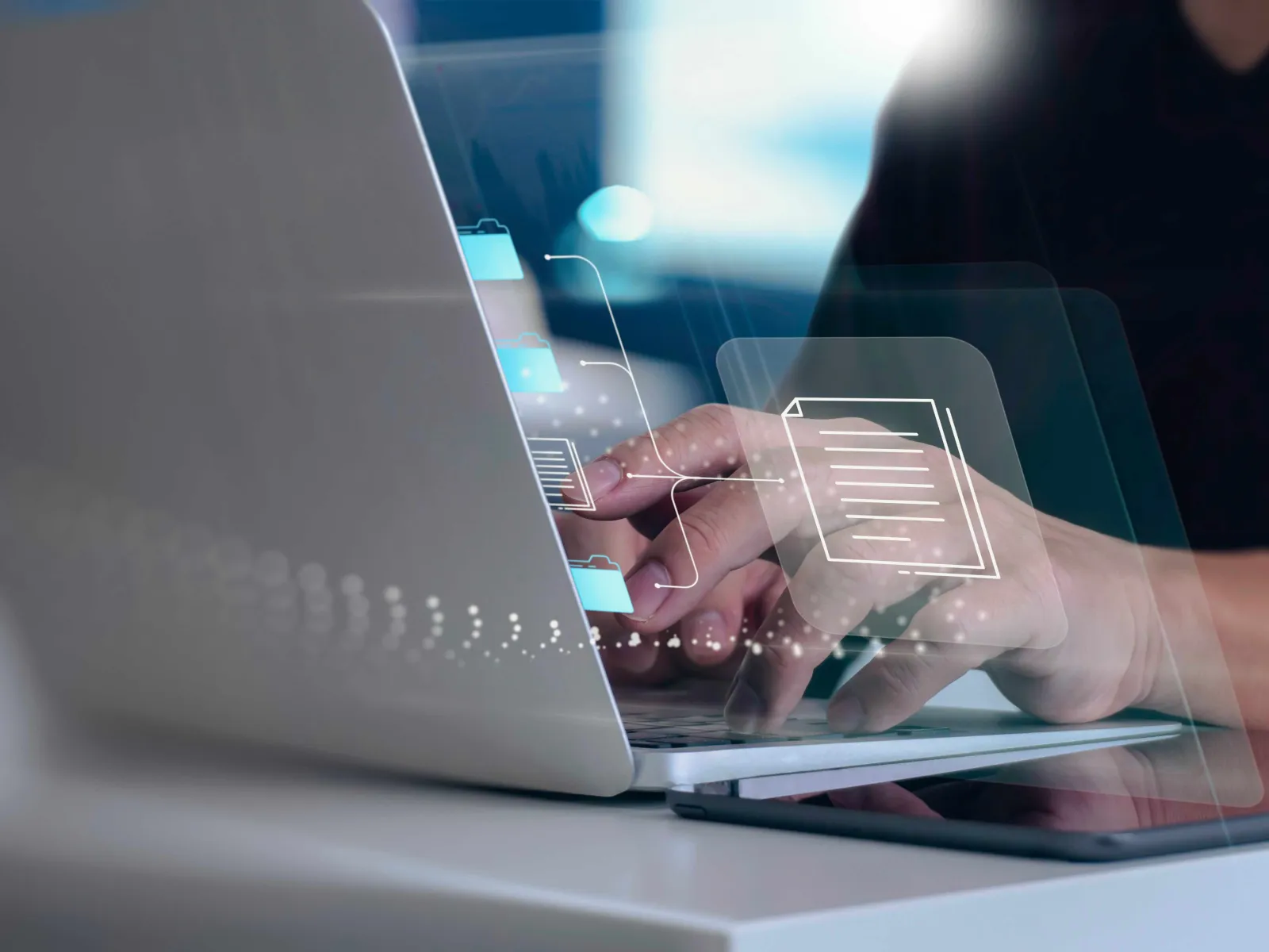 a close-up of a person using a laptop