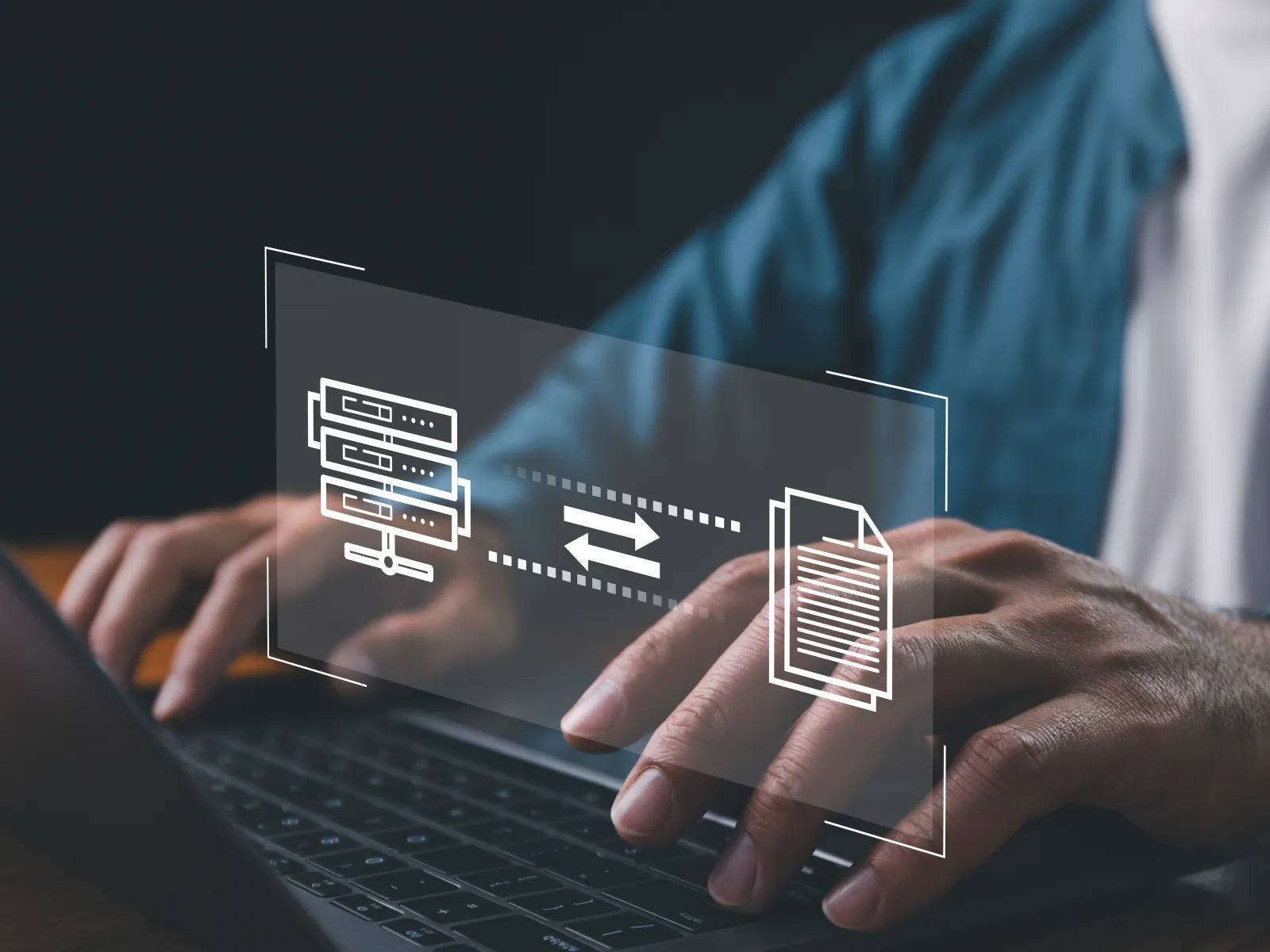 Person using laptop with digital icons showing data transfer between server and document file.