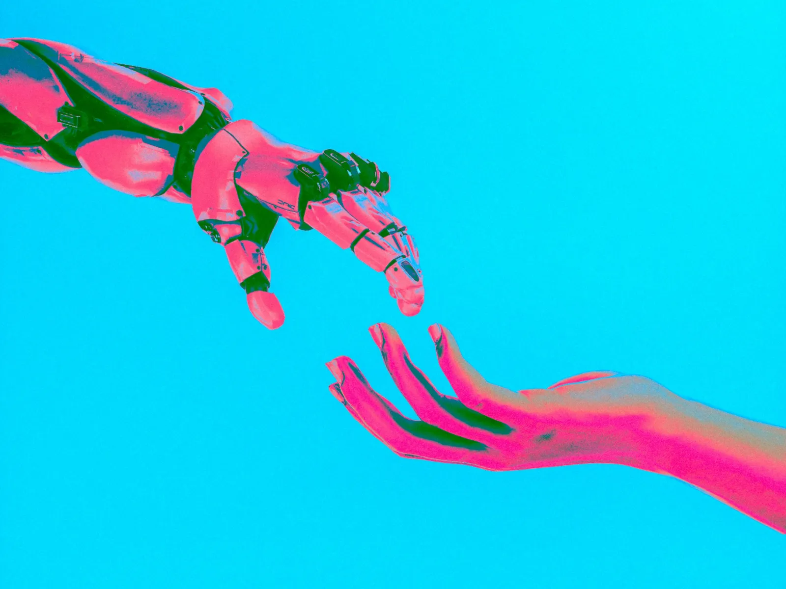 Robotic hand reaching out to a human hand against a bright blue background symbolizing connection and technology.