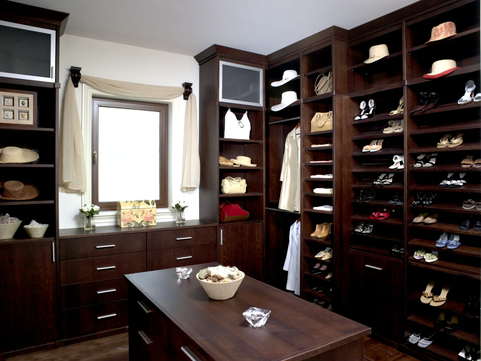 a room with a table and shelves
