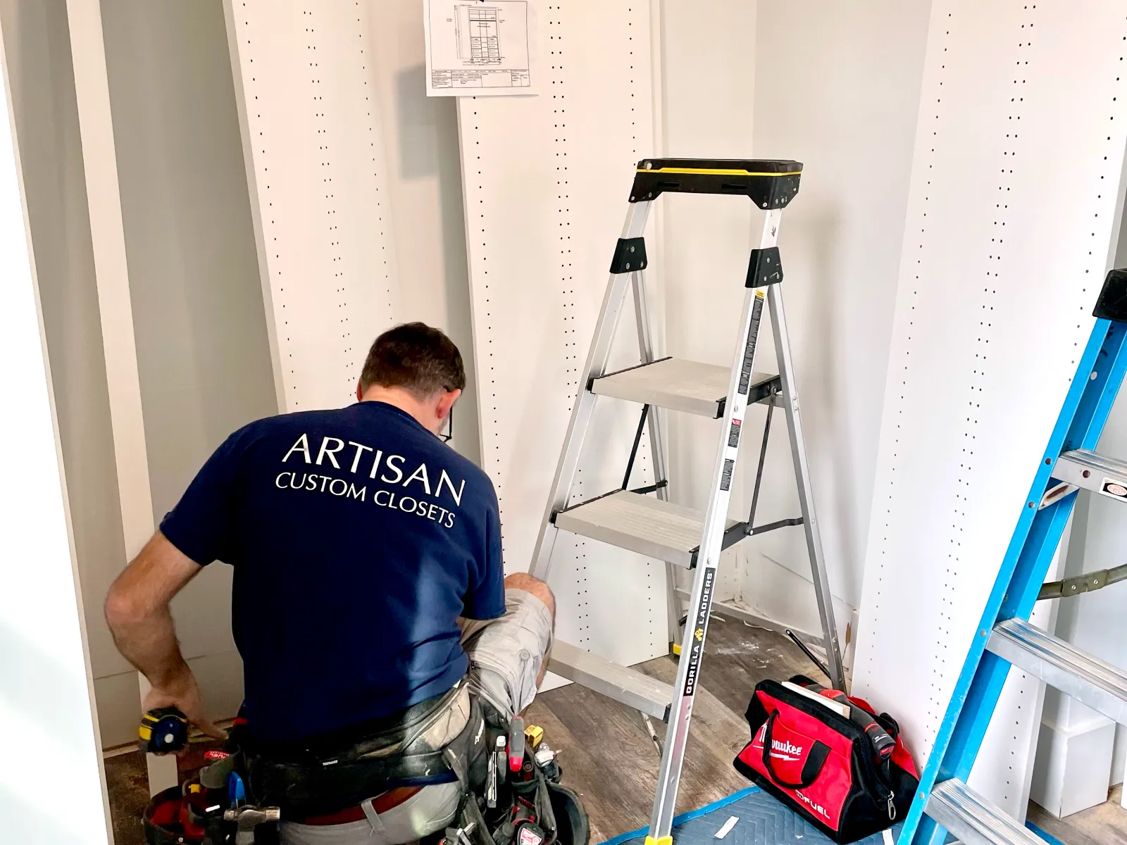 a man painting a wall