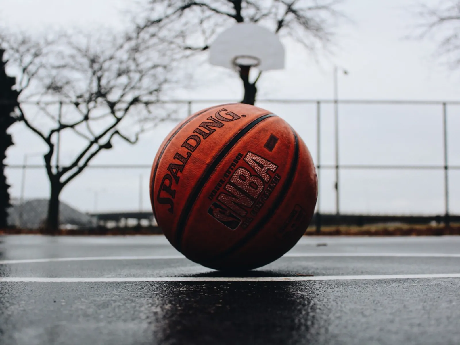 a basketball on the side of a road