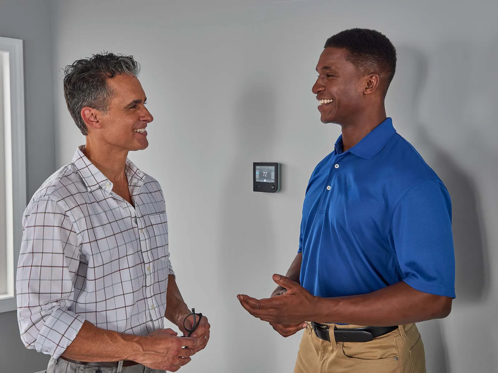 a couple of men shaking hands