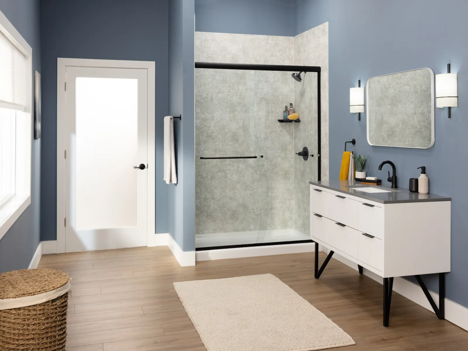 a bathroom with a sink and a shower unit