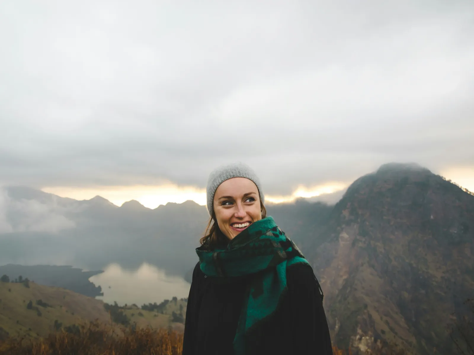 a person standing on a mountain
