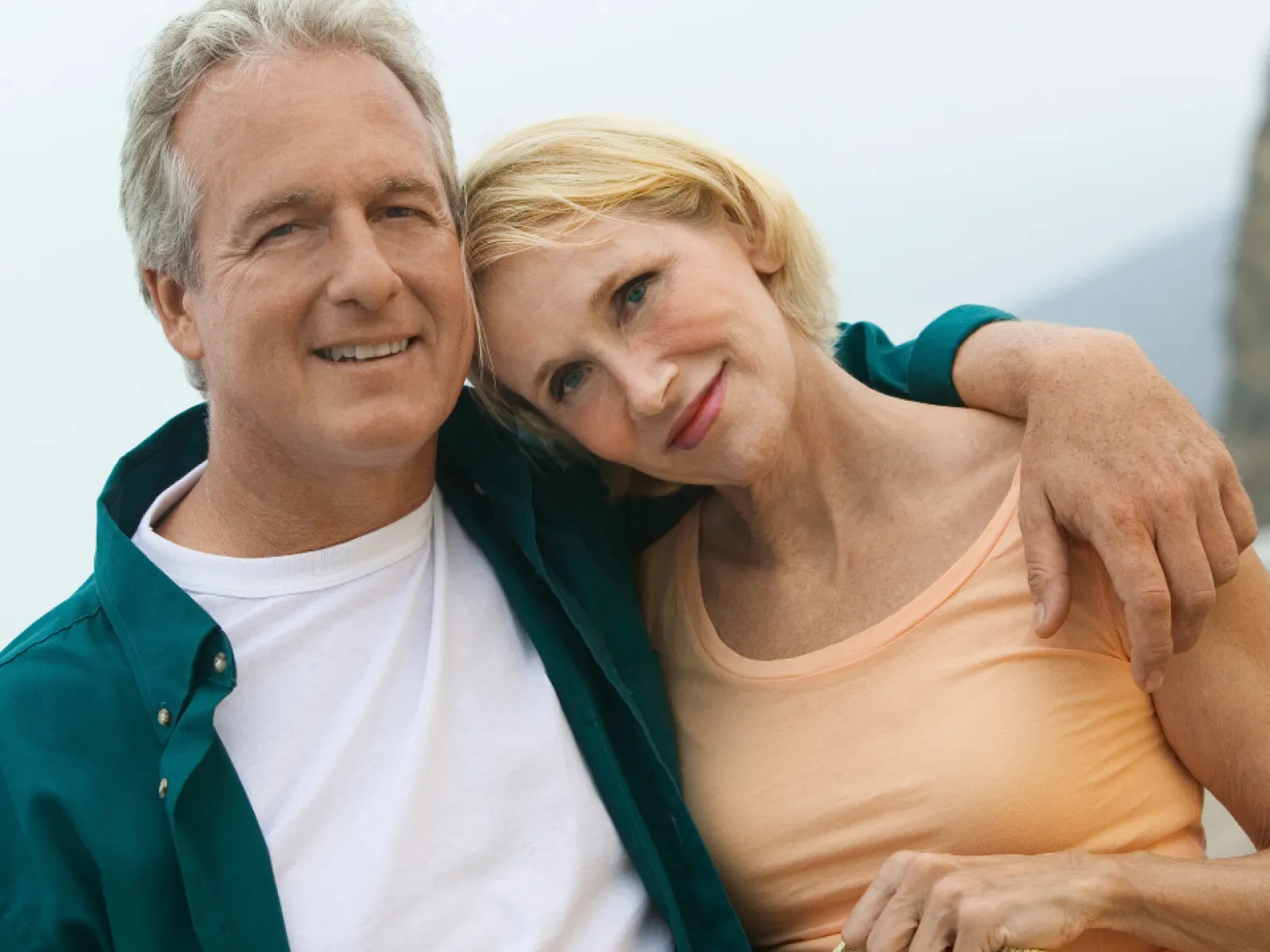 a man and woman posing for a picture