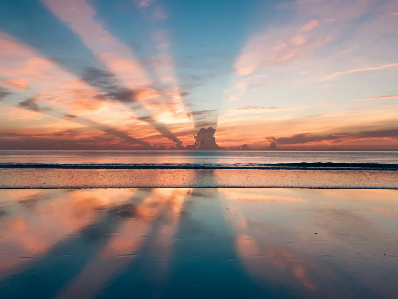 a sunset over a body of water