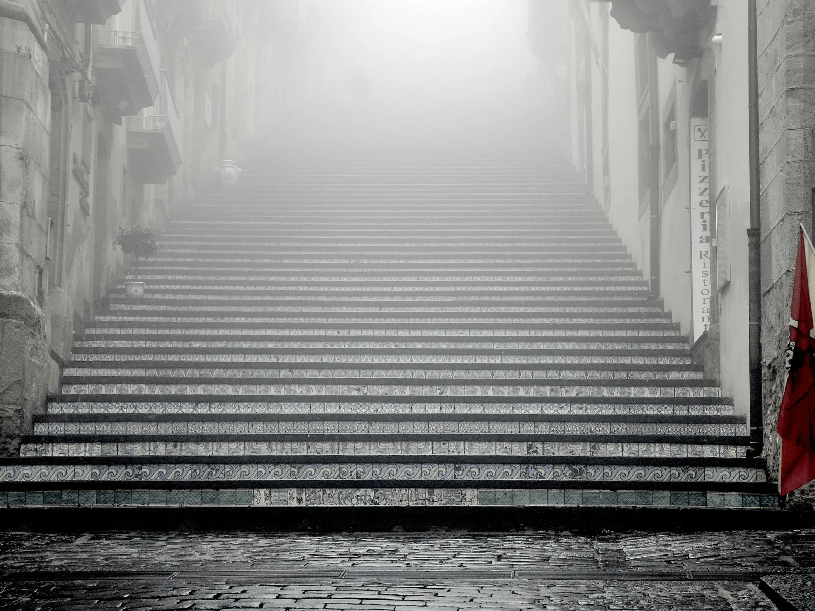 a staircase with a flag