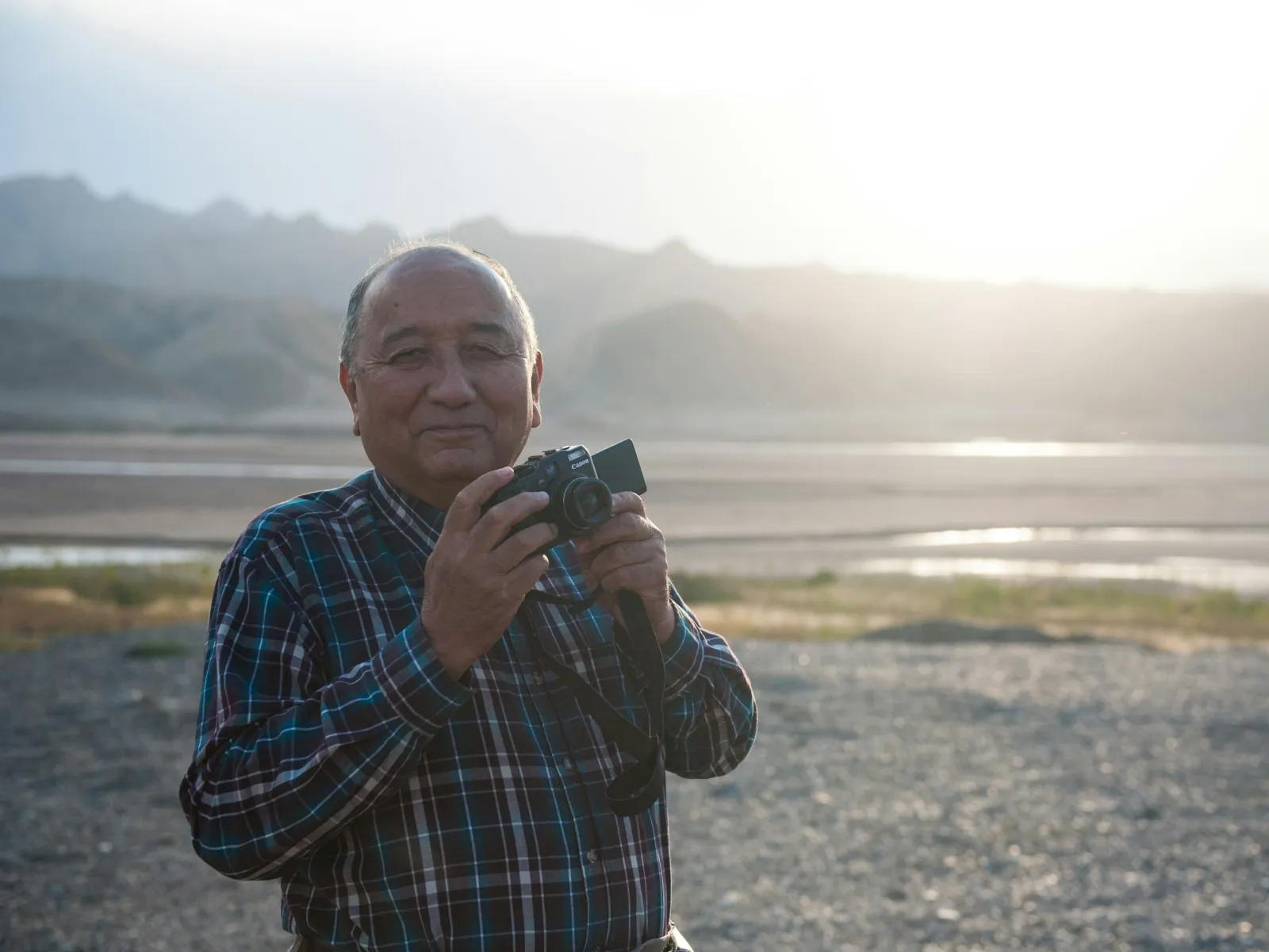 a man holding a camera