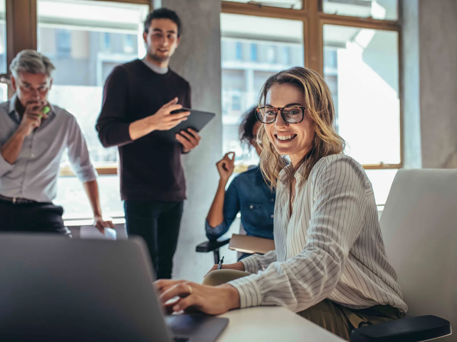 a group of people in an office