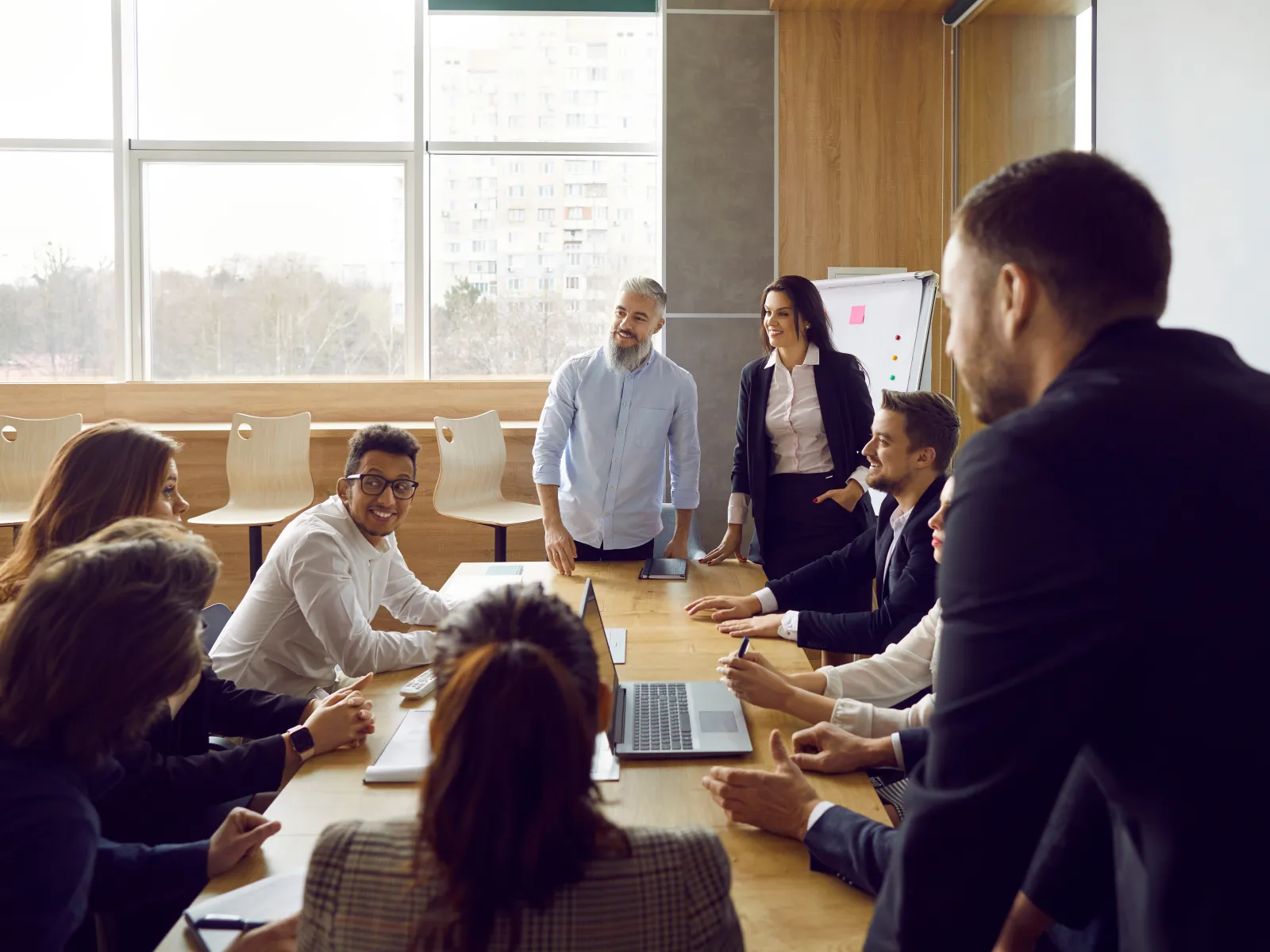 a group of people in a meeting