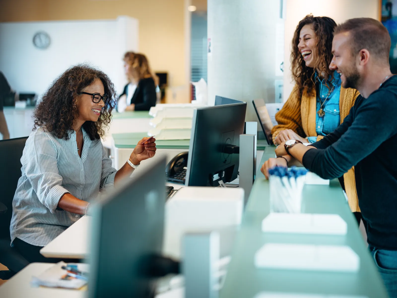 a group of people in an office