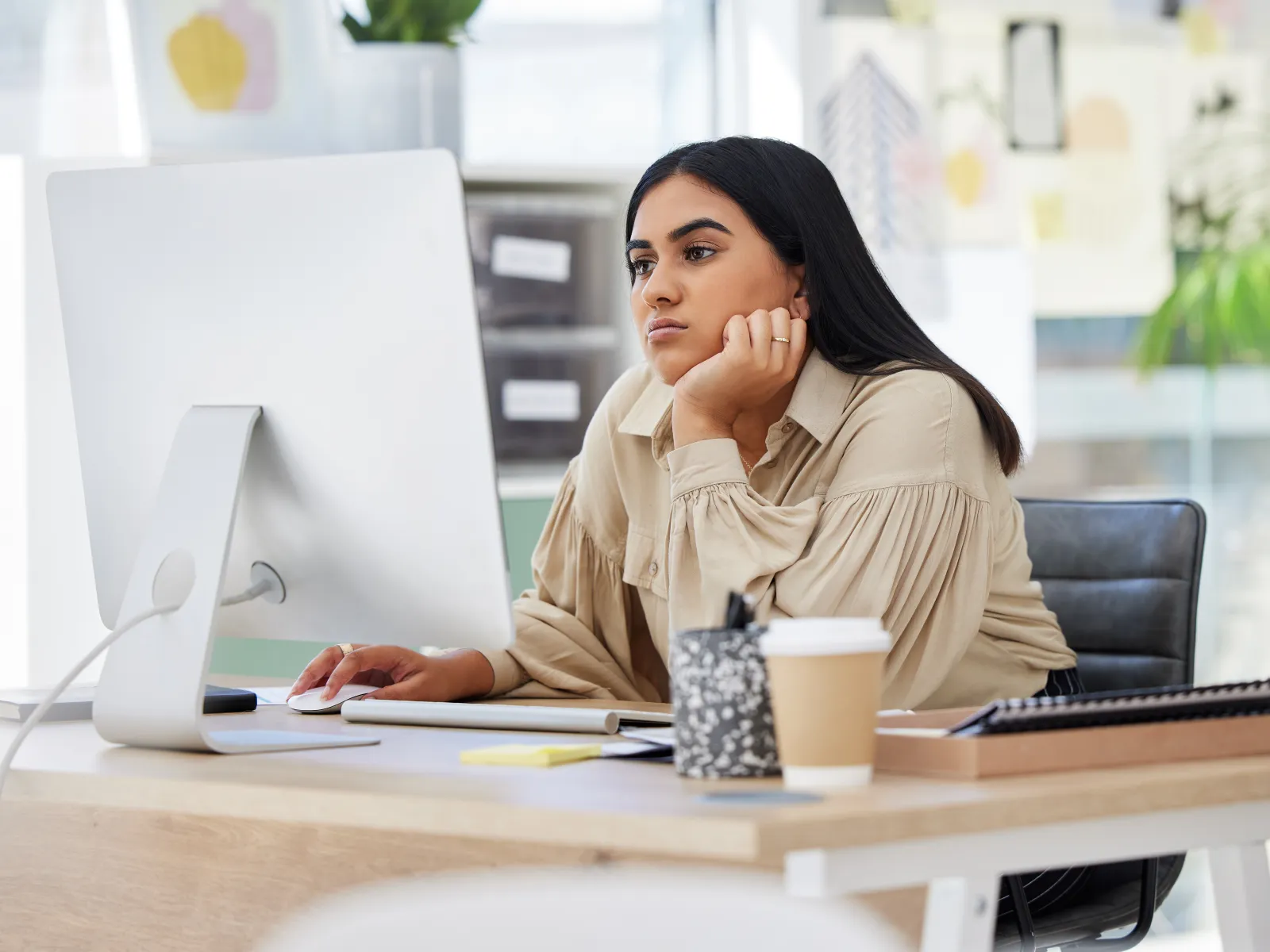 a woman sitting at a desk