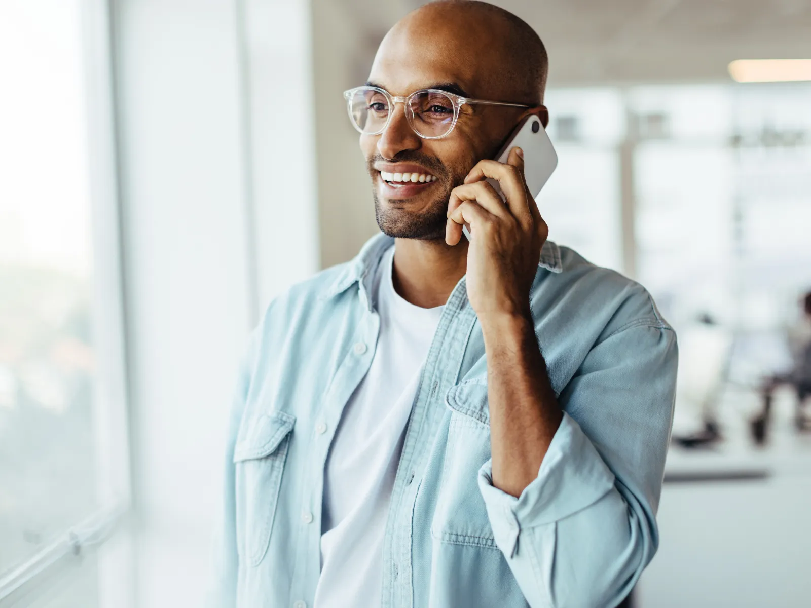 a man talking on a cell phone