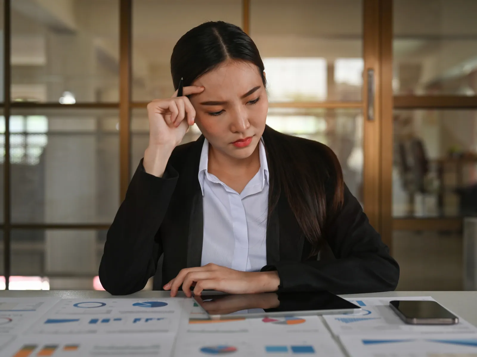 a woman looking at a phone