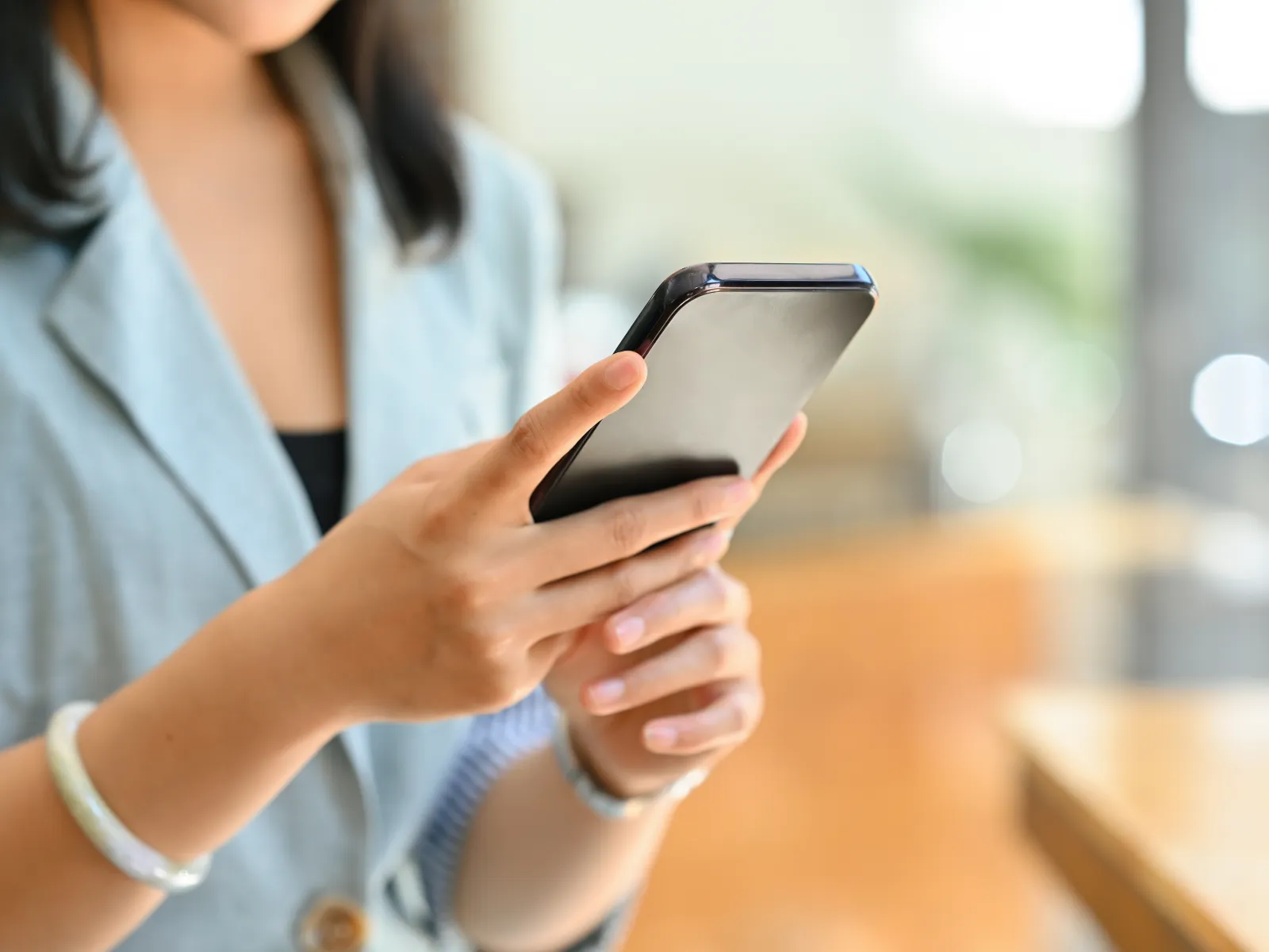 a woman holding a tablet