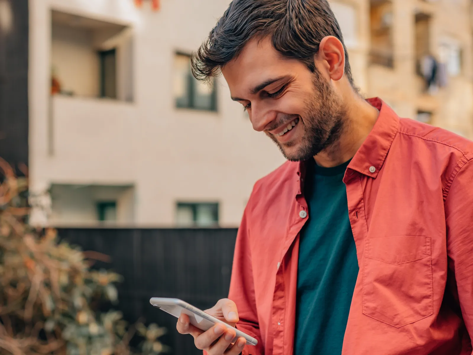 a man looking at a tablet