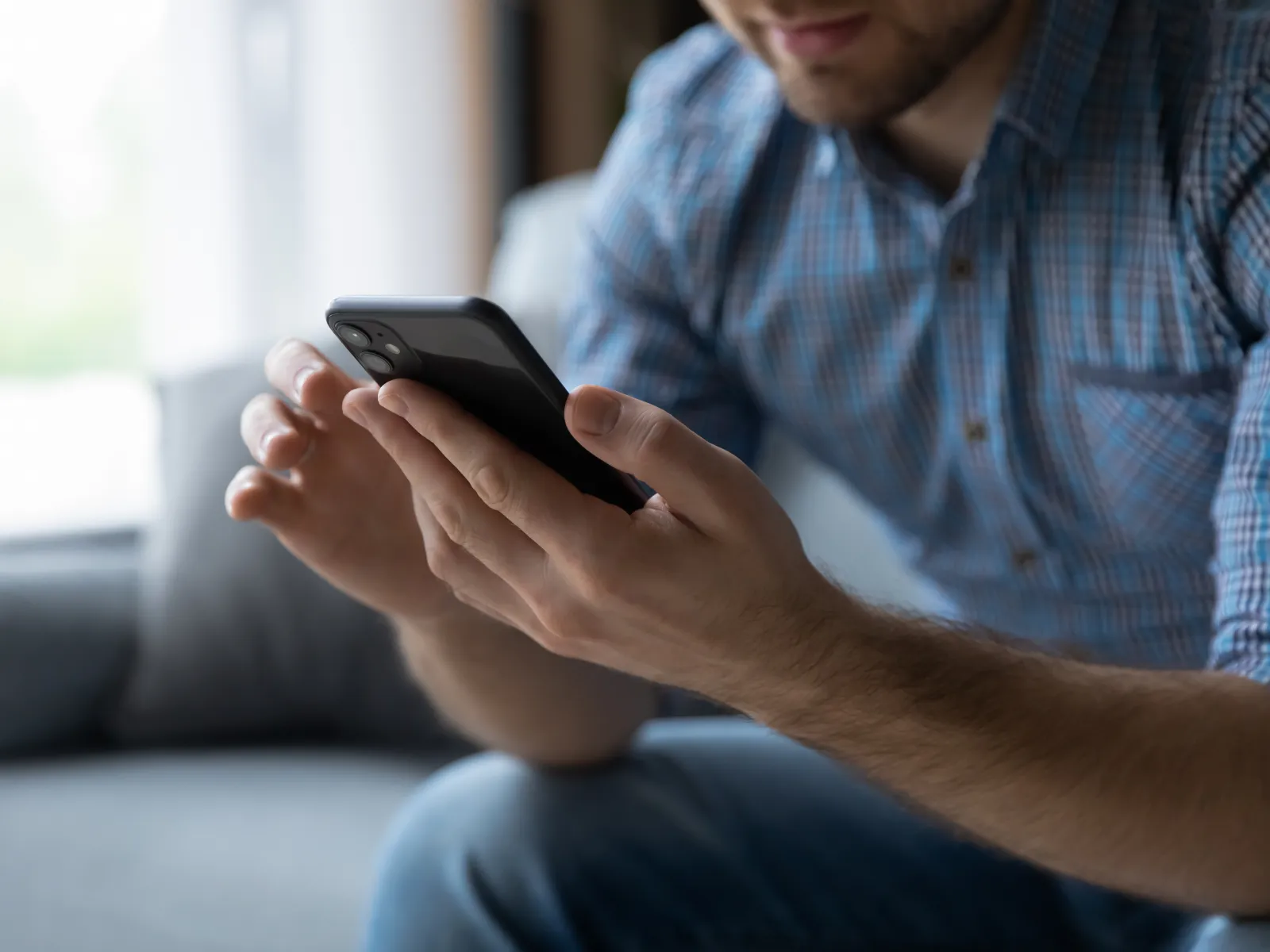 a man holding a phone
