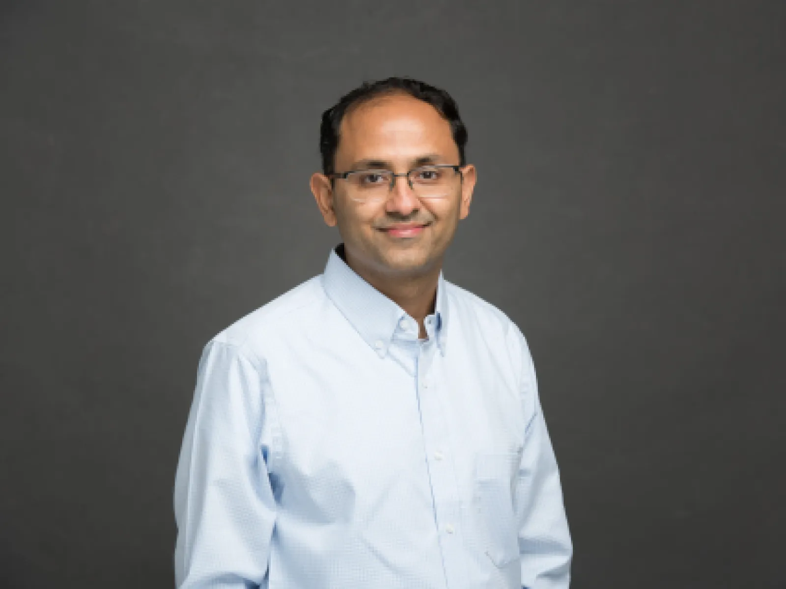 a man wearing glasses