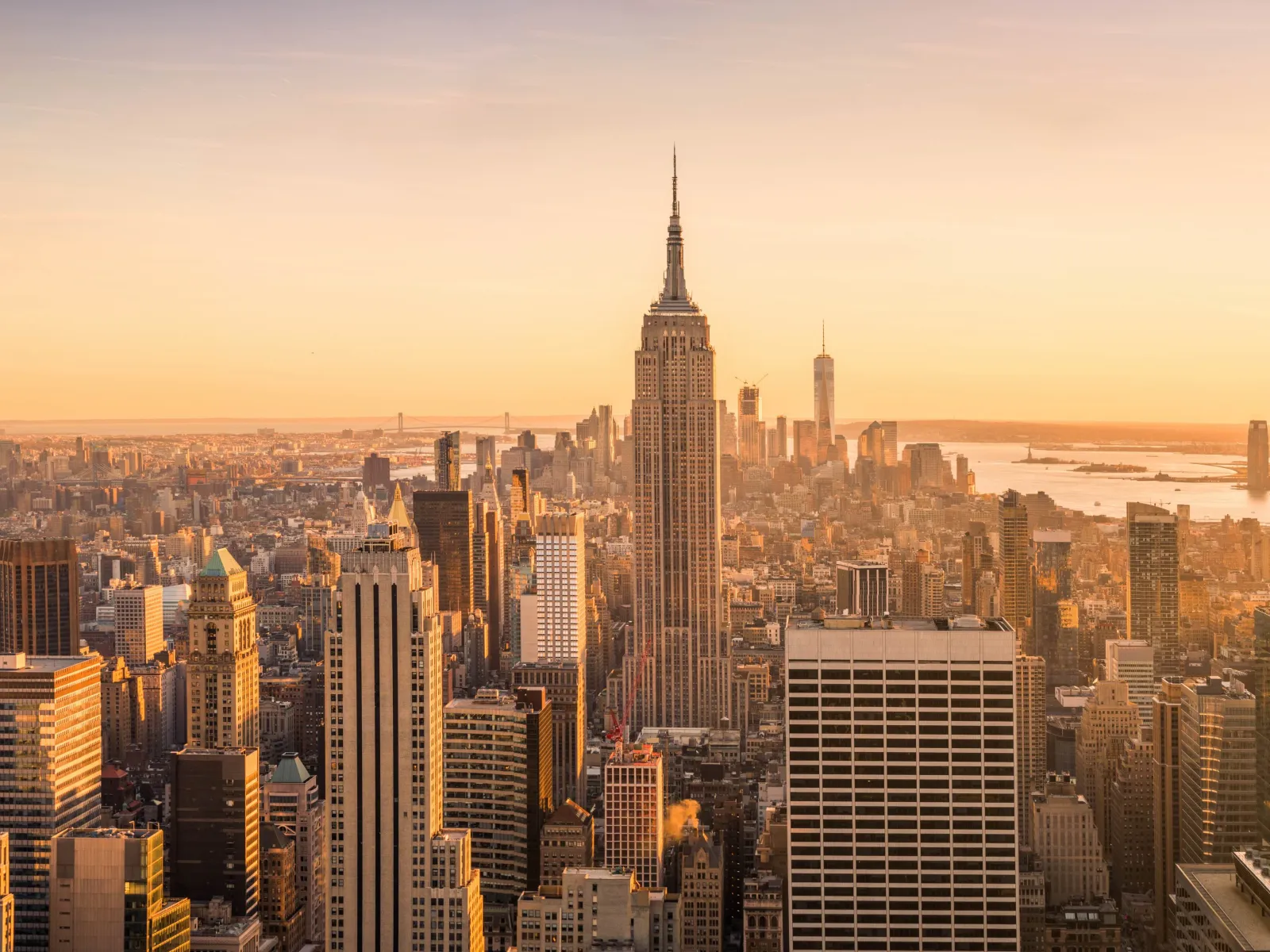 a city skyline with many tall buildings