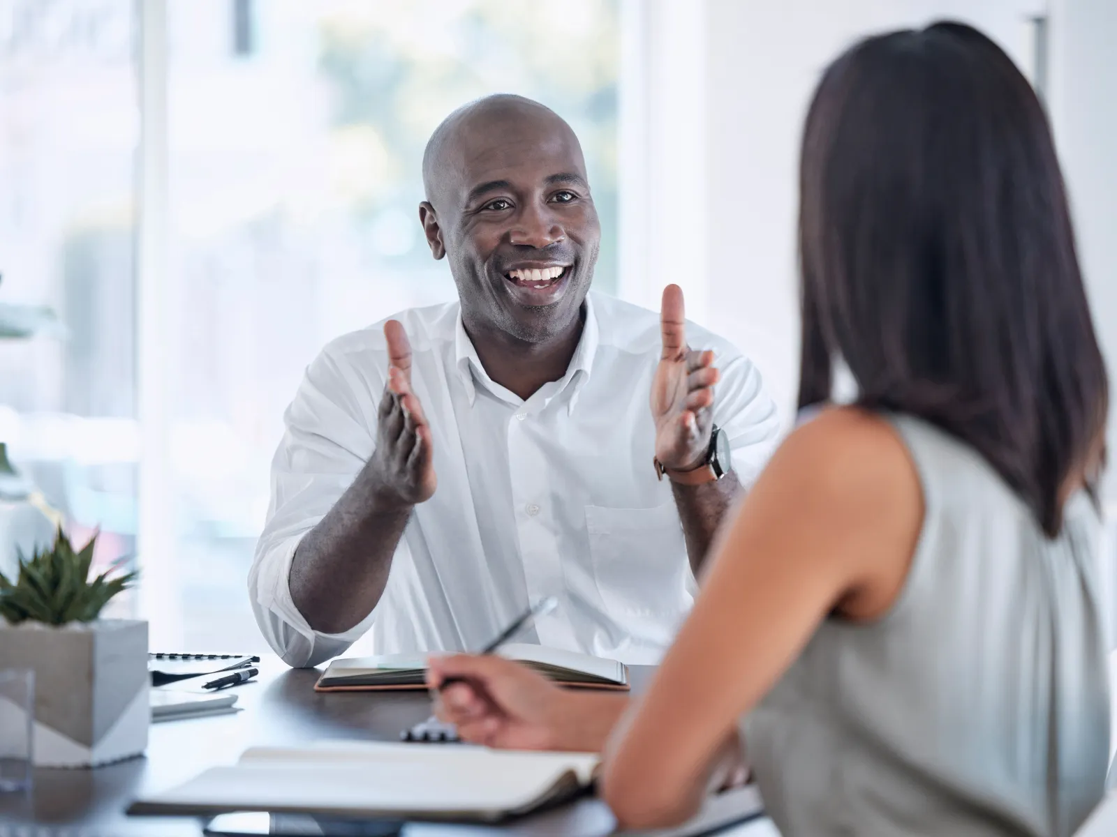 a man and a woman talking