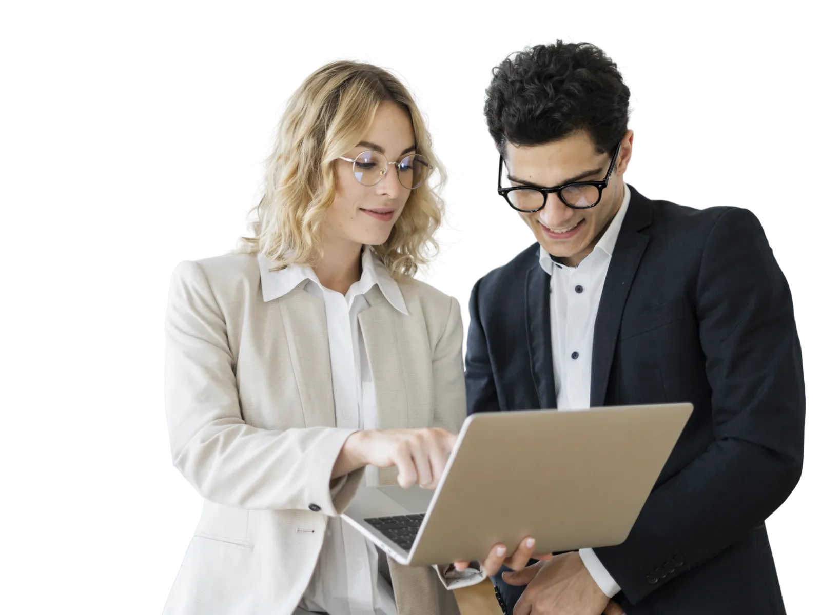 a man and a woman looking at a laptop