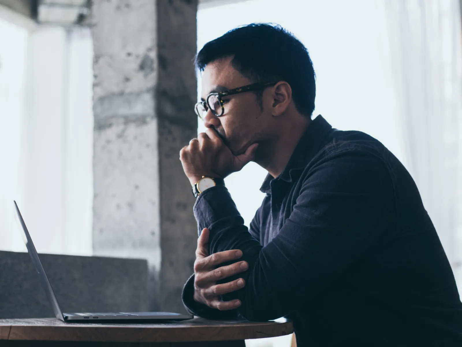 a man with a laptop