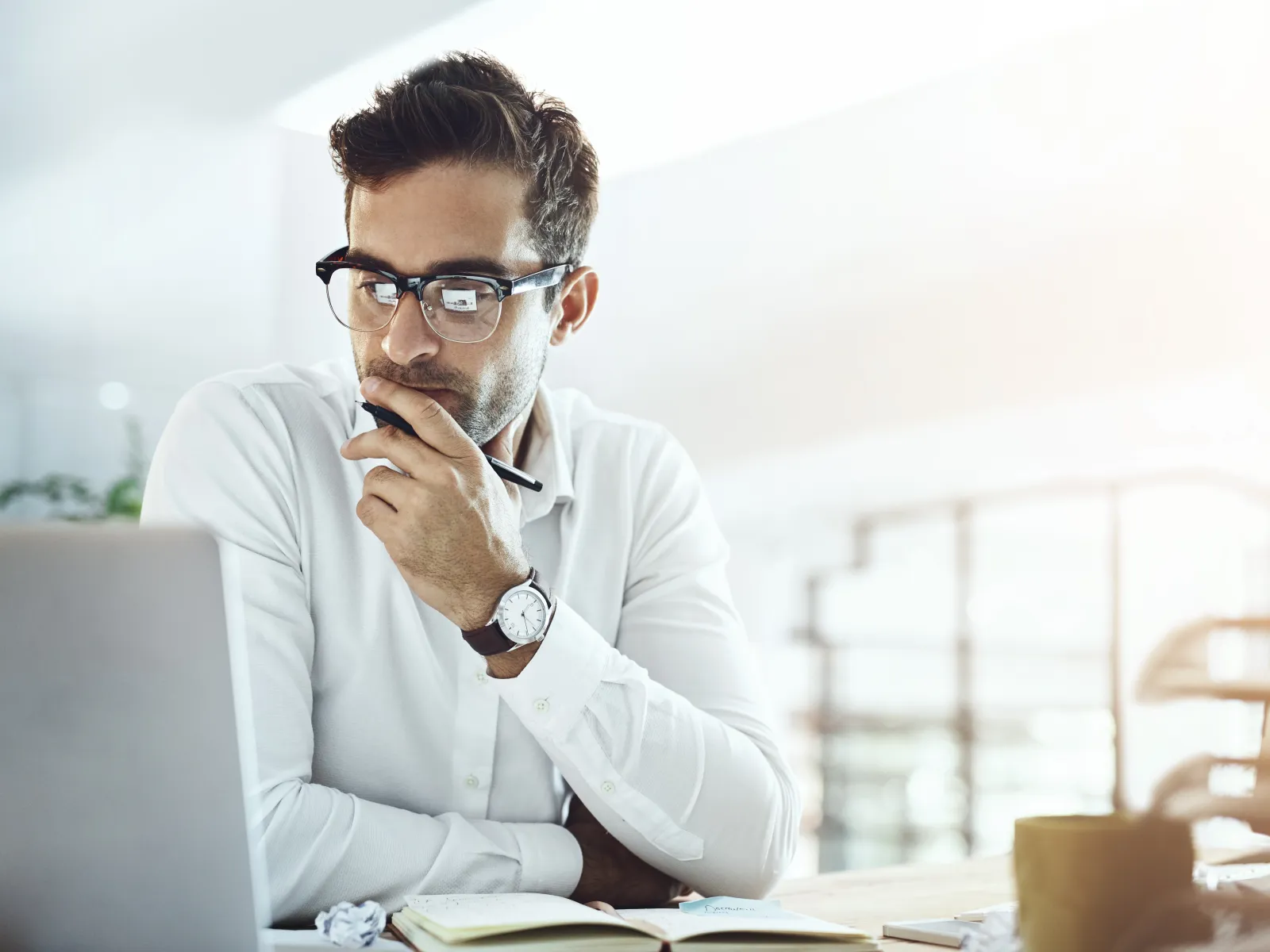 a man sitting at a desk