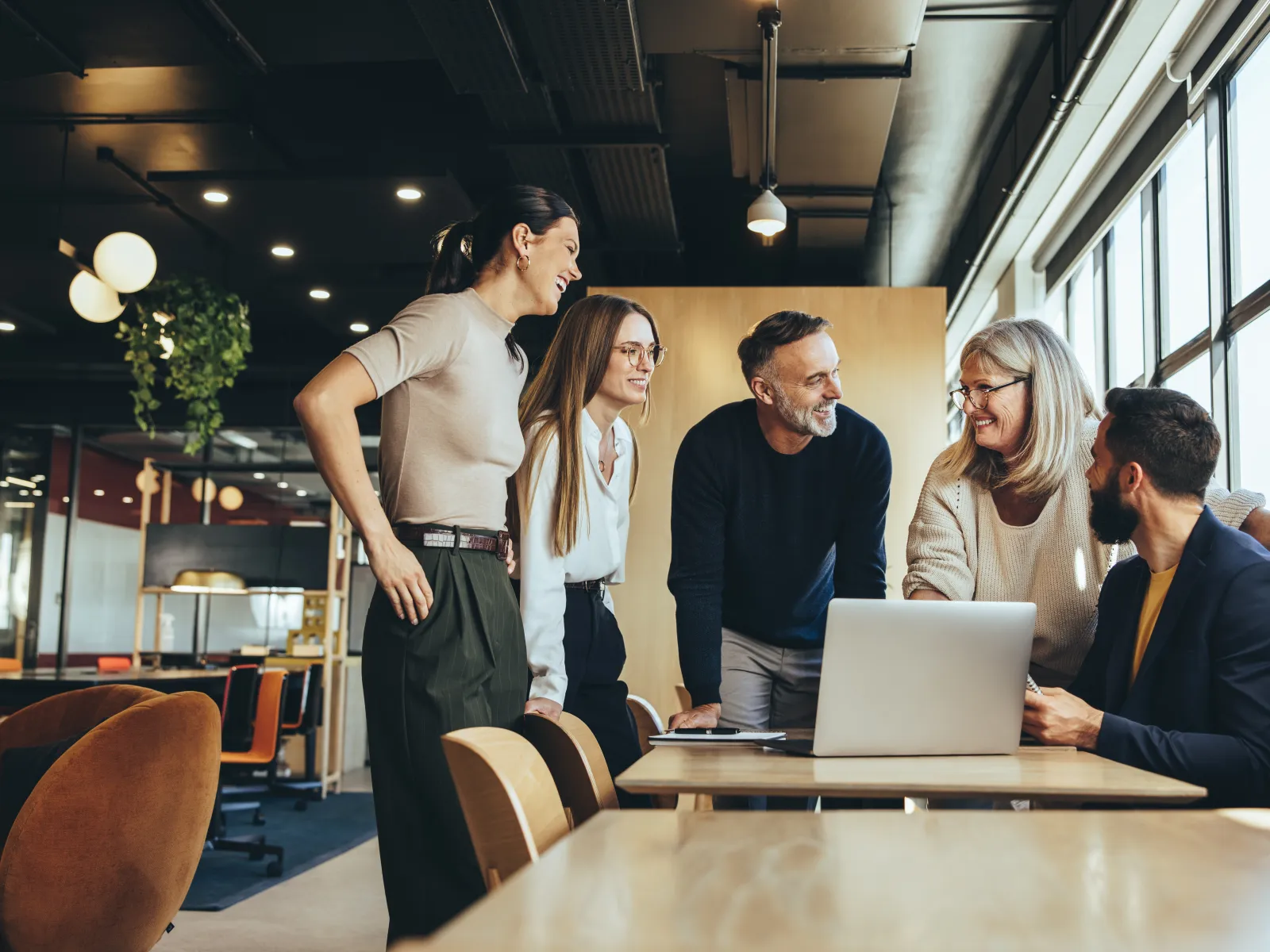 a group of people in a meeting