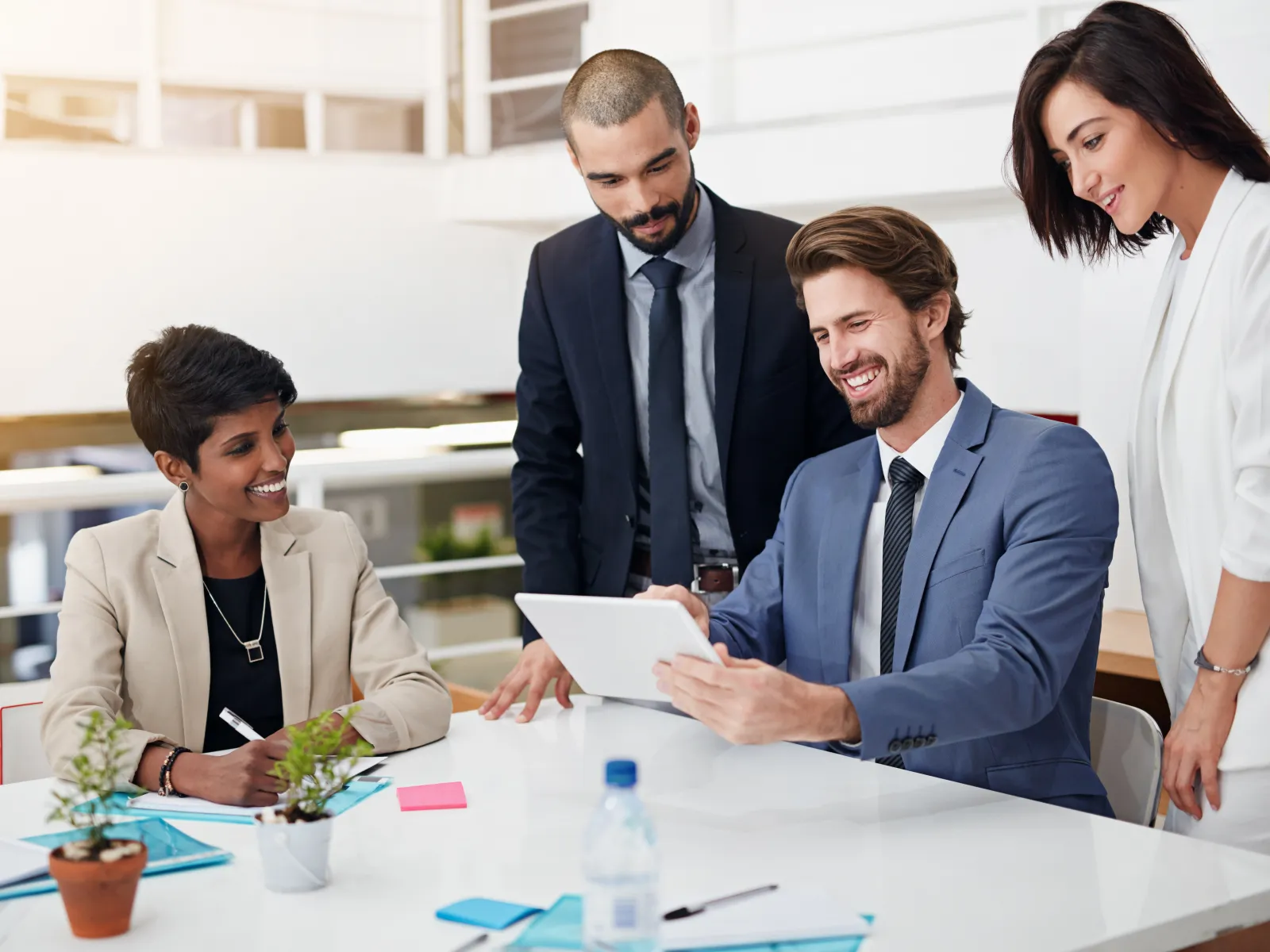 a group of people in a meeting