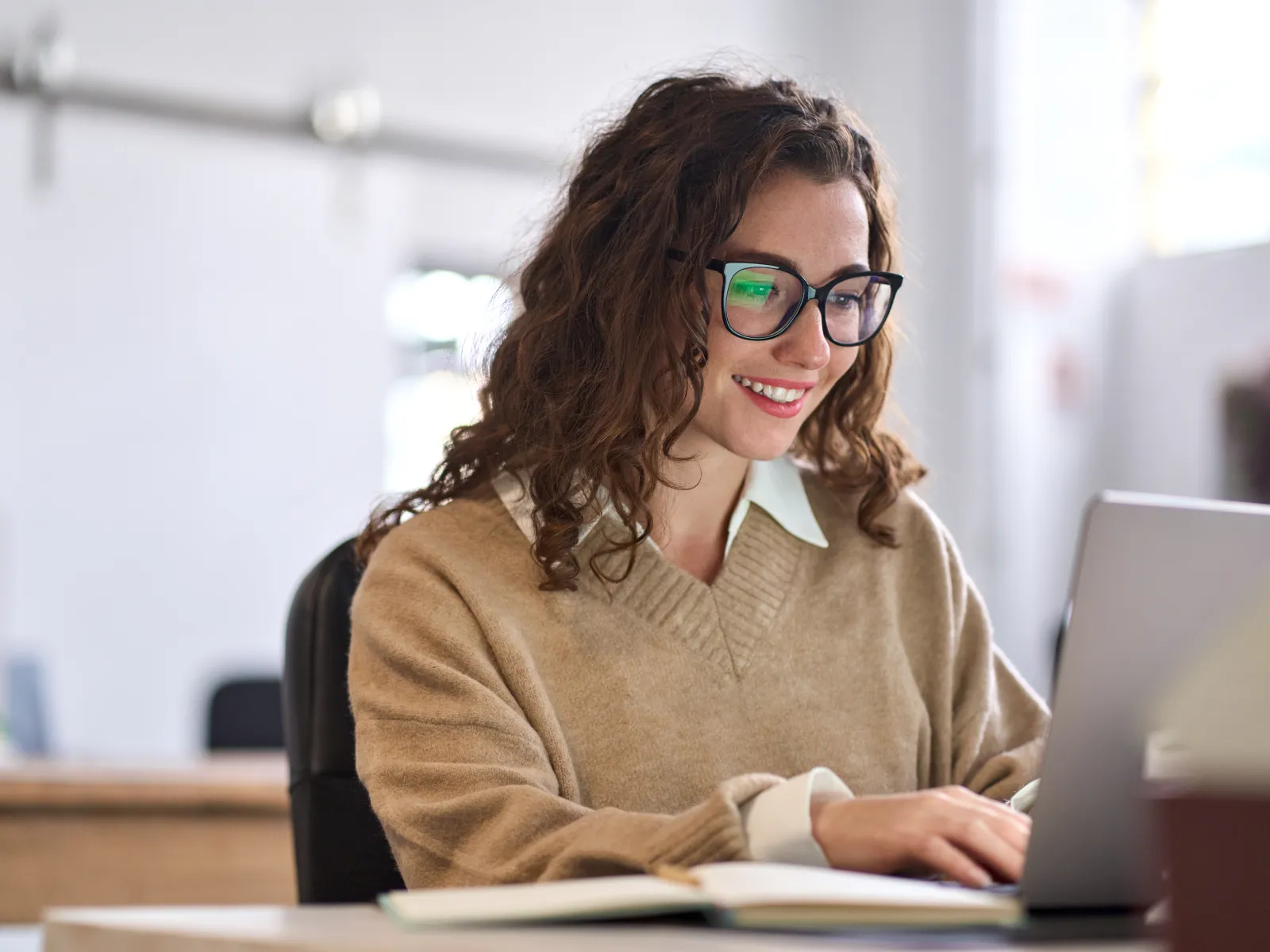 Surveillance system interface showing multiple live camera feeds with highlighted individuals in an indoor building.