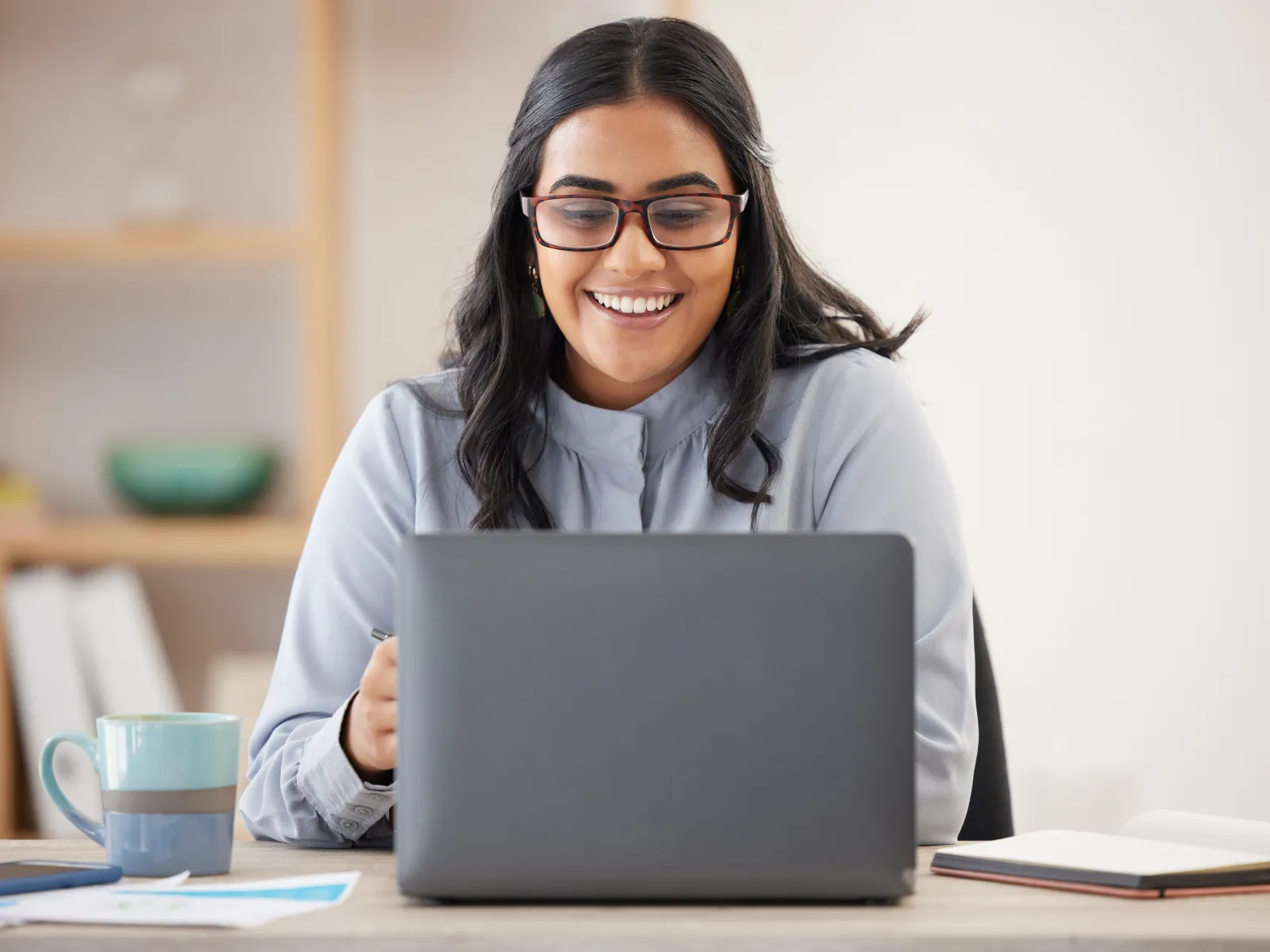 Surveillance system interface showing multiple live camera feeds with highlighted individuals in an indoor building.