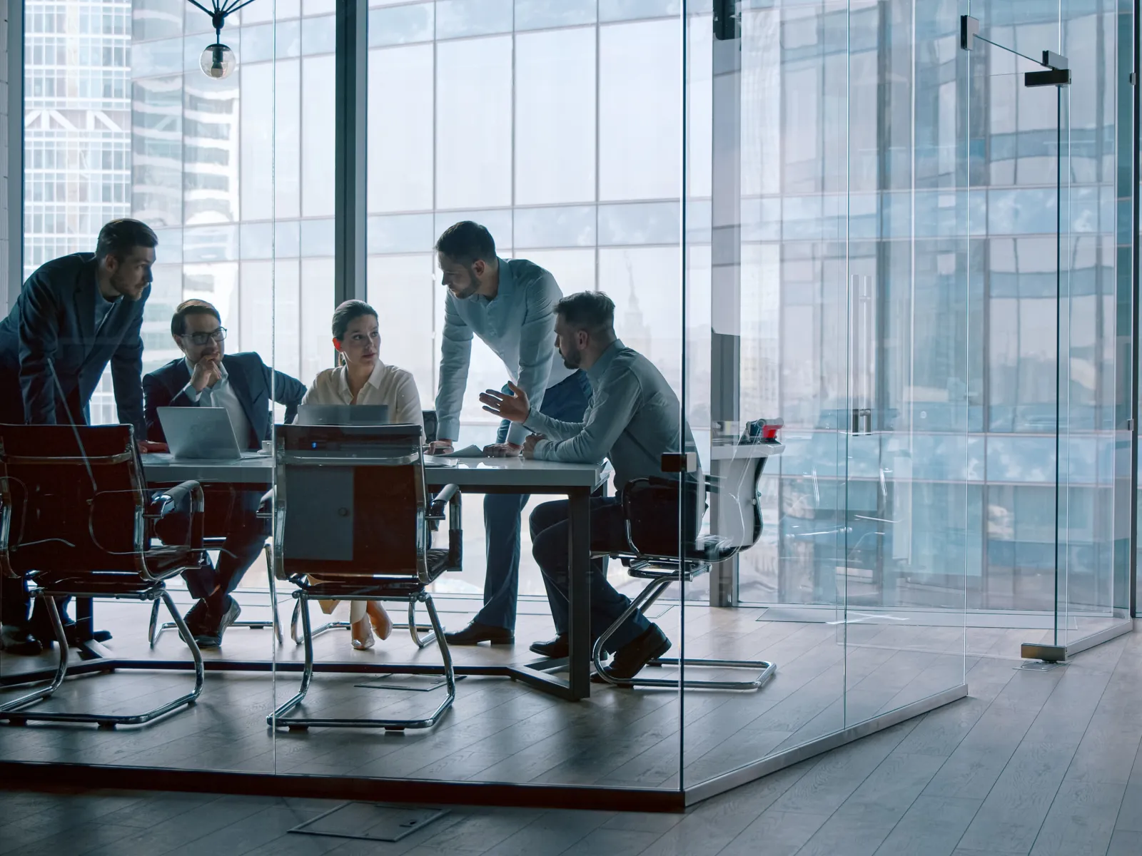 a group of people sitting around a table