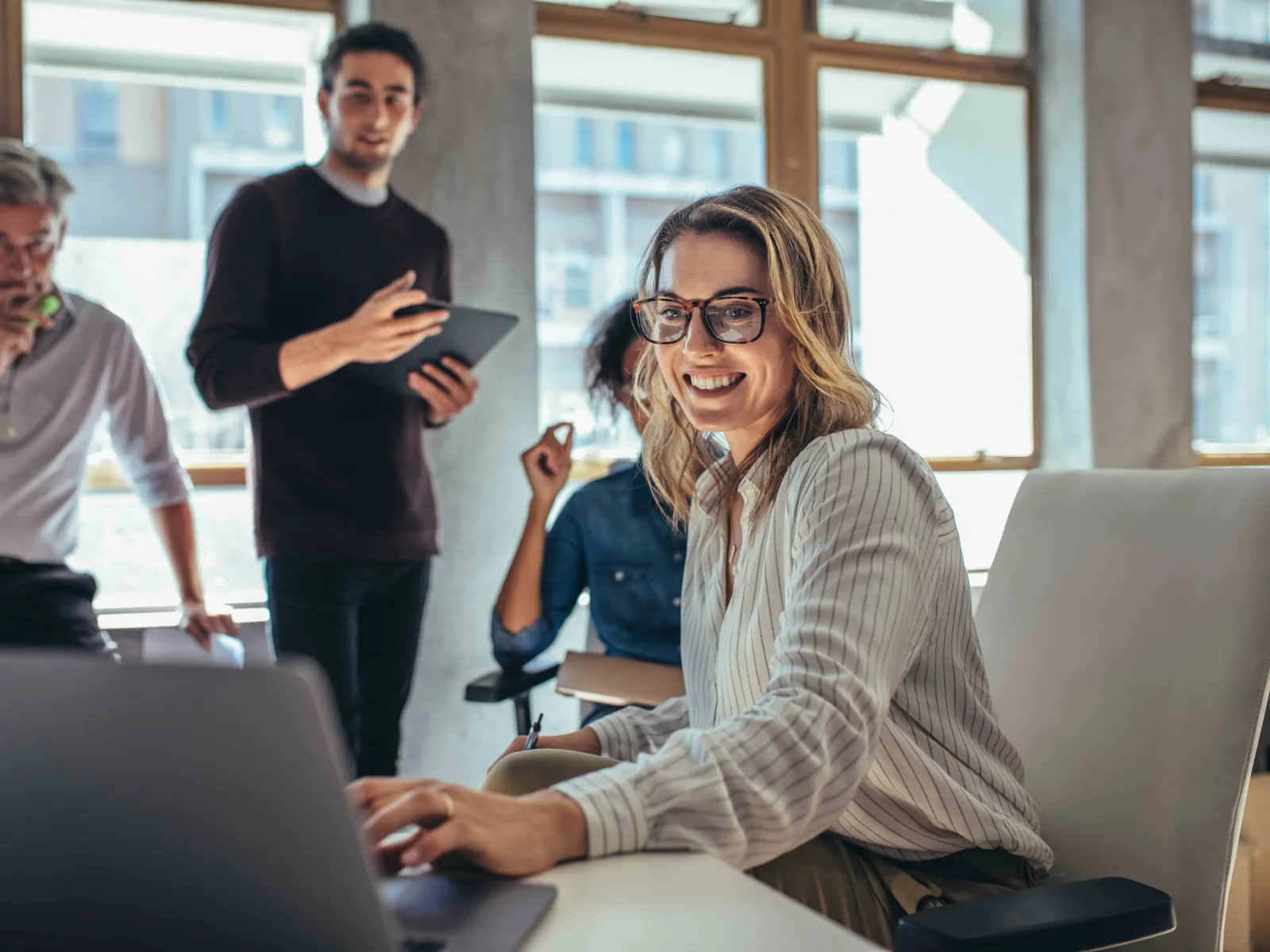 a group of people in an office