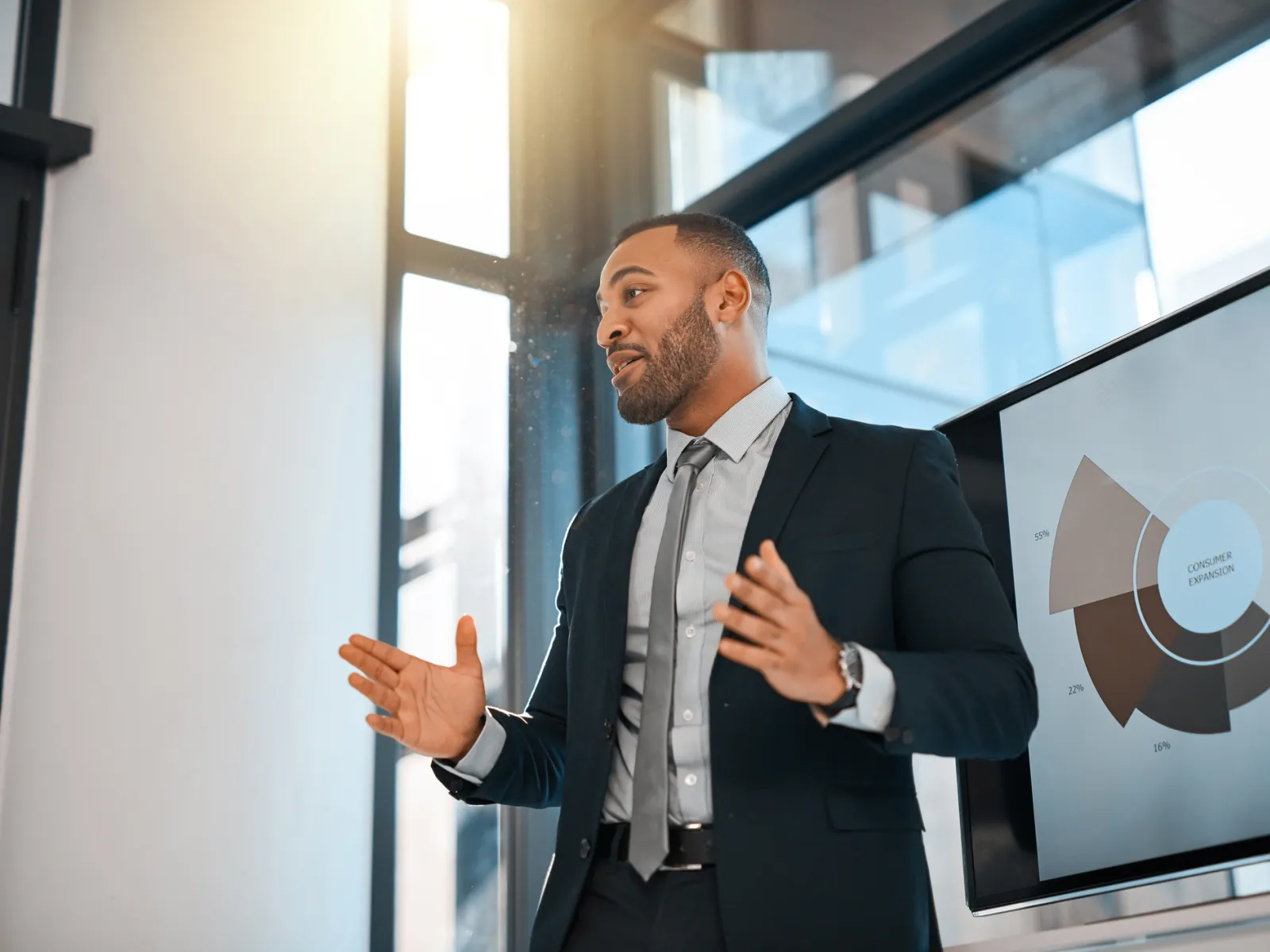 a man in a suit talking