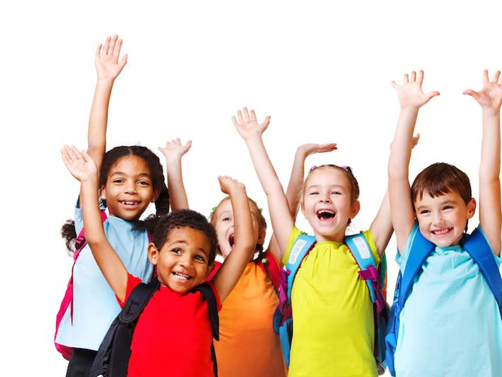 Group of diverse smiling schoolchildren with backpacks raising hands joyfully on white background