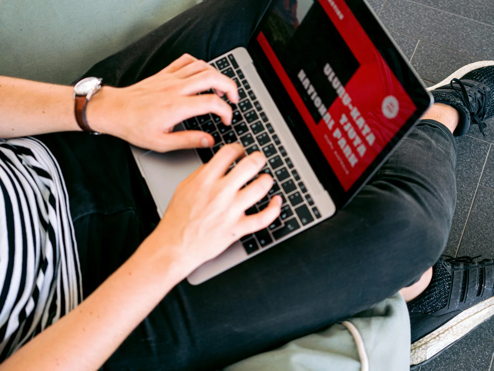 a person holding a tablet
